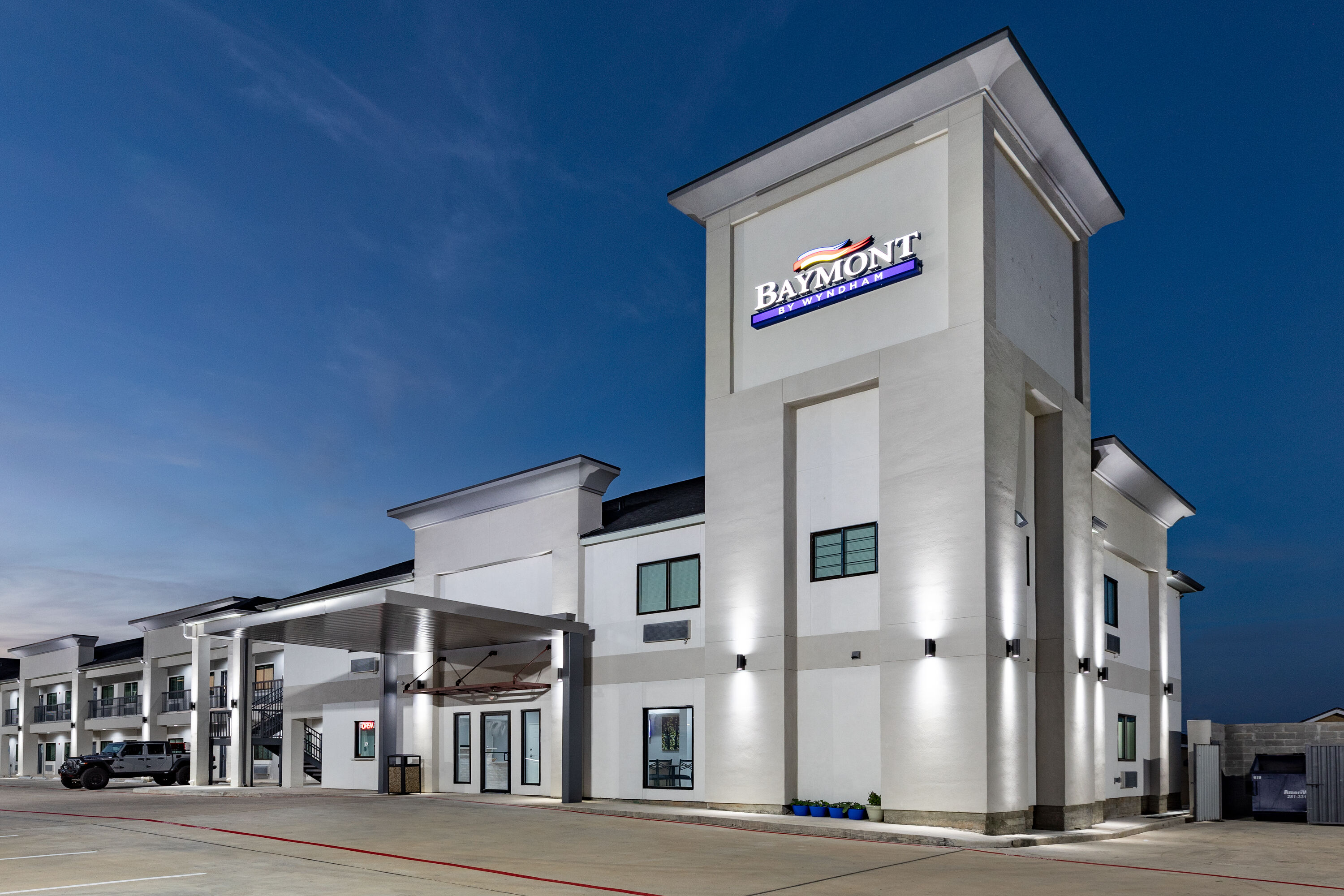Exterior Dusk Image of Baymont by Wyndham Freeport Texas hotel in Freeport, Texas