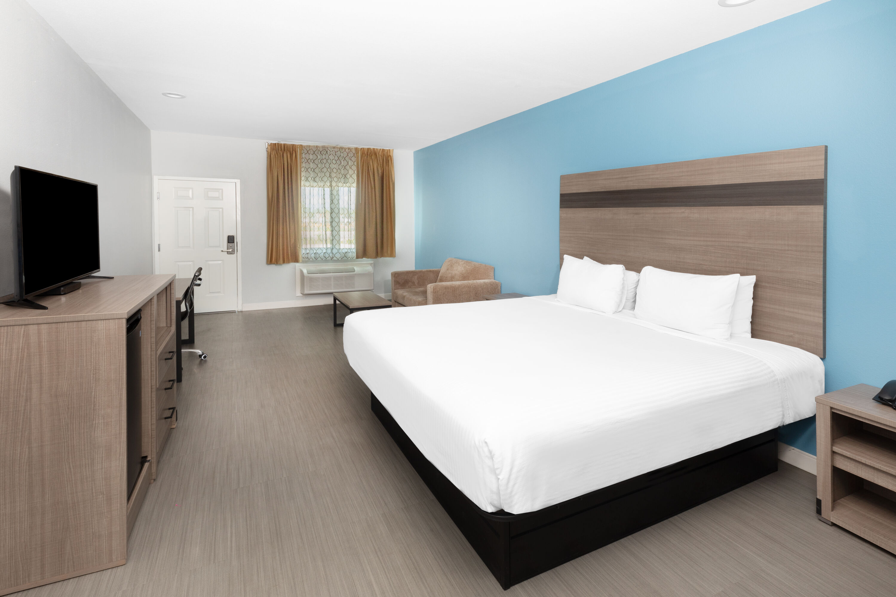 Guest room at the Baymont by Wyndham Freeport Texas in Freeport, Texas