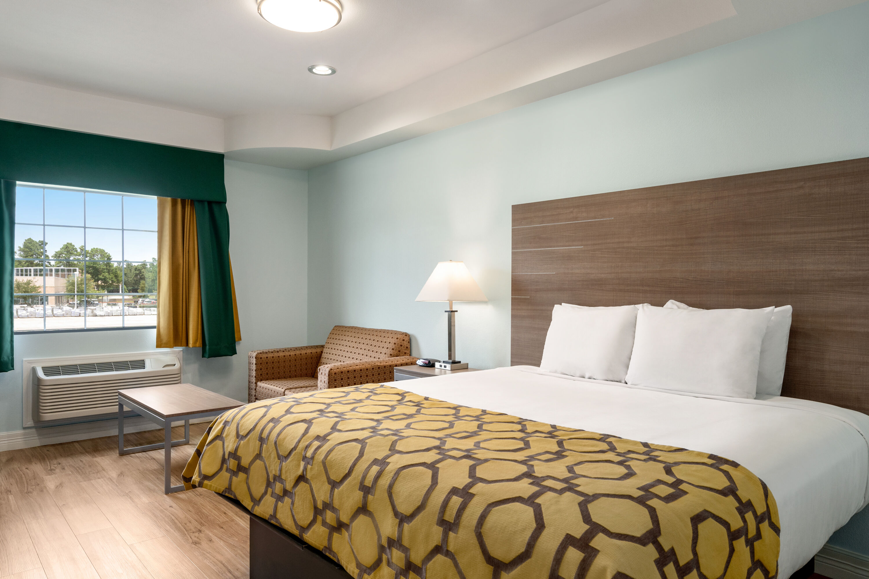 Guest room at the Baymont by Wyndham Kingwood in Kingwood, Texas