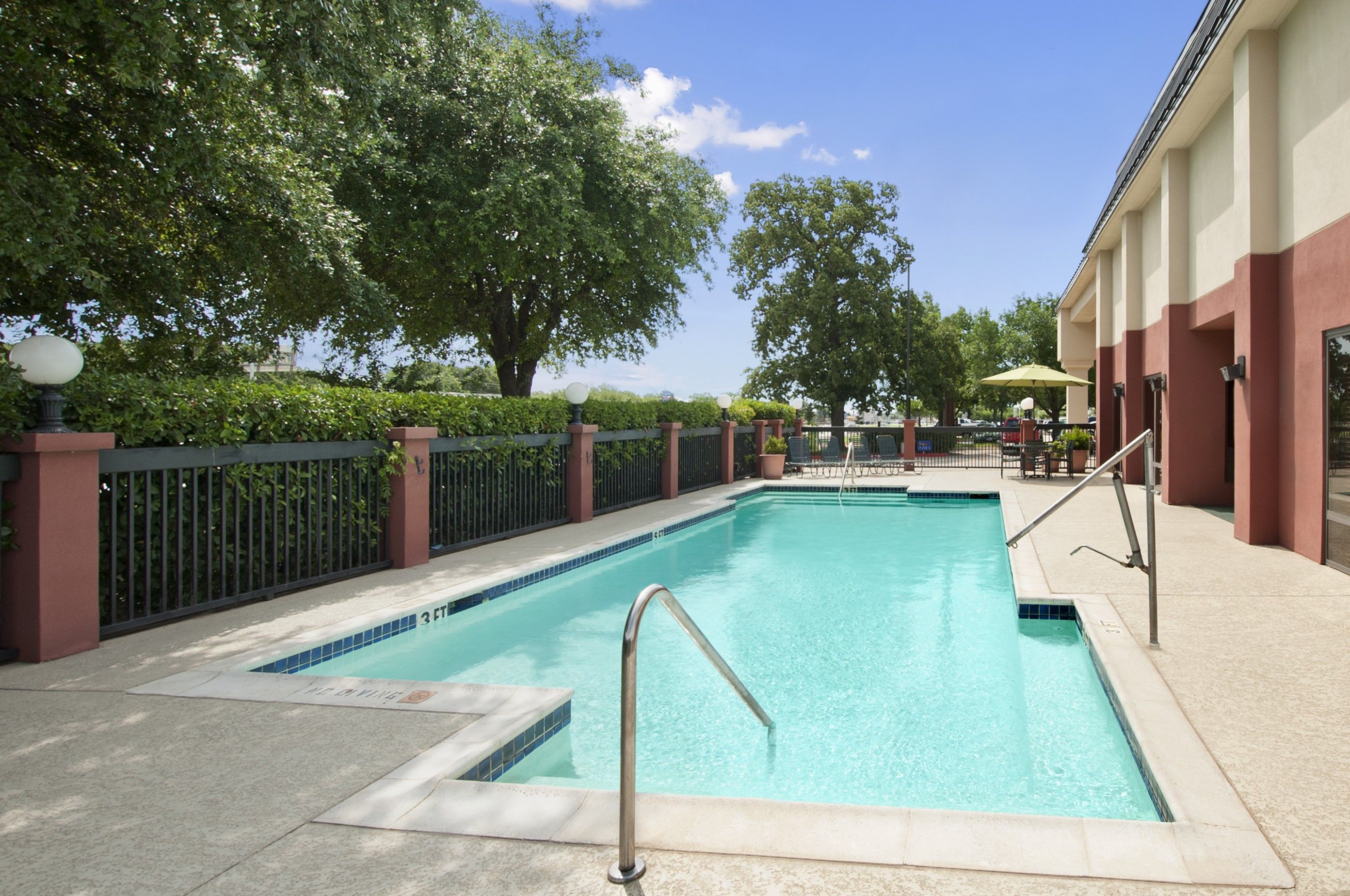 Pool at the Baymont by Wyndham Lewisville in Lewisville, Texas
