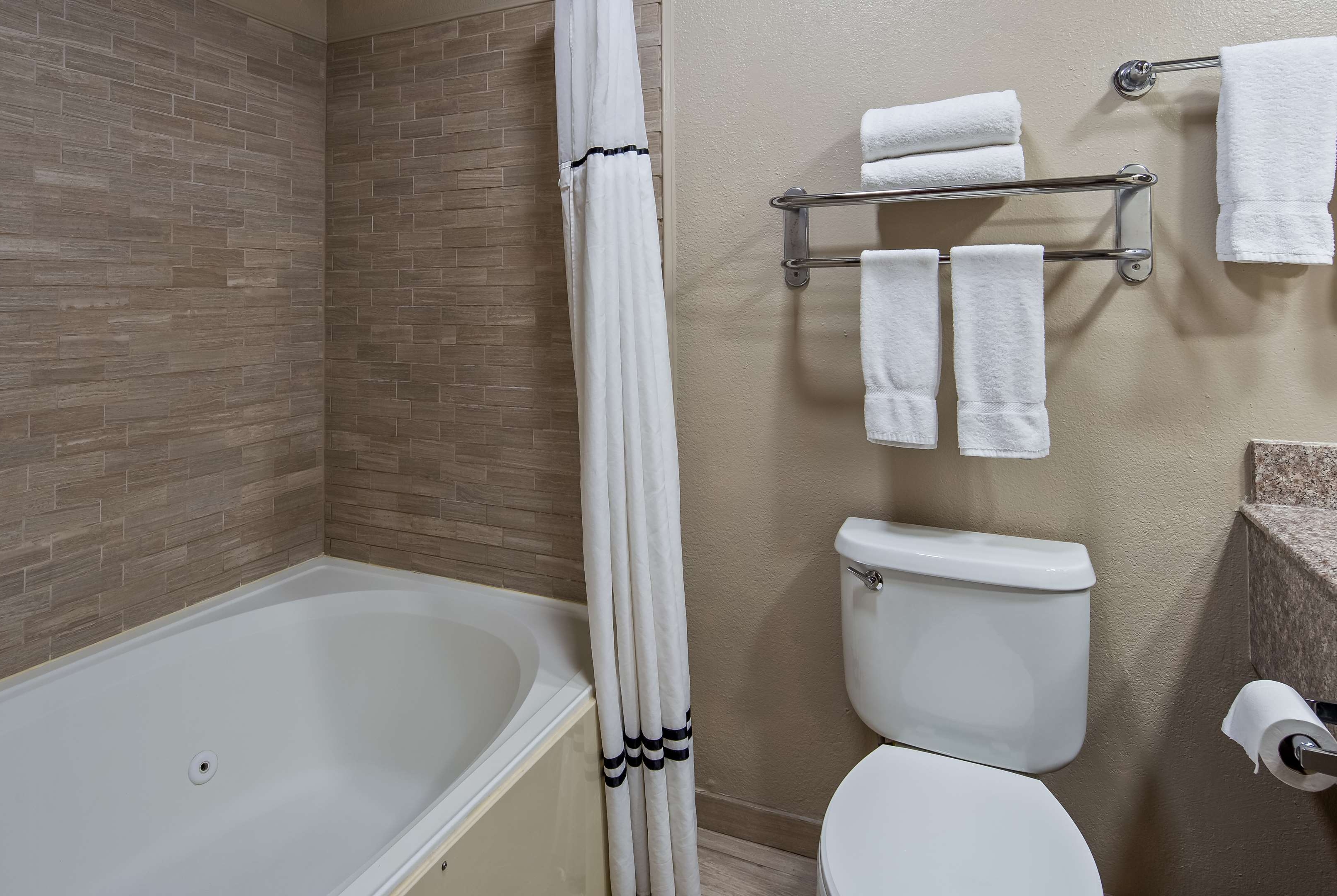 Guest room at the Baymont by Wyndham Lubbock in Lubbock, Texas