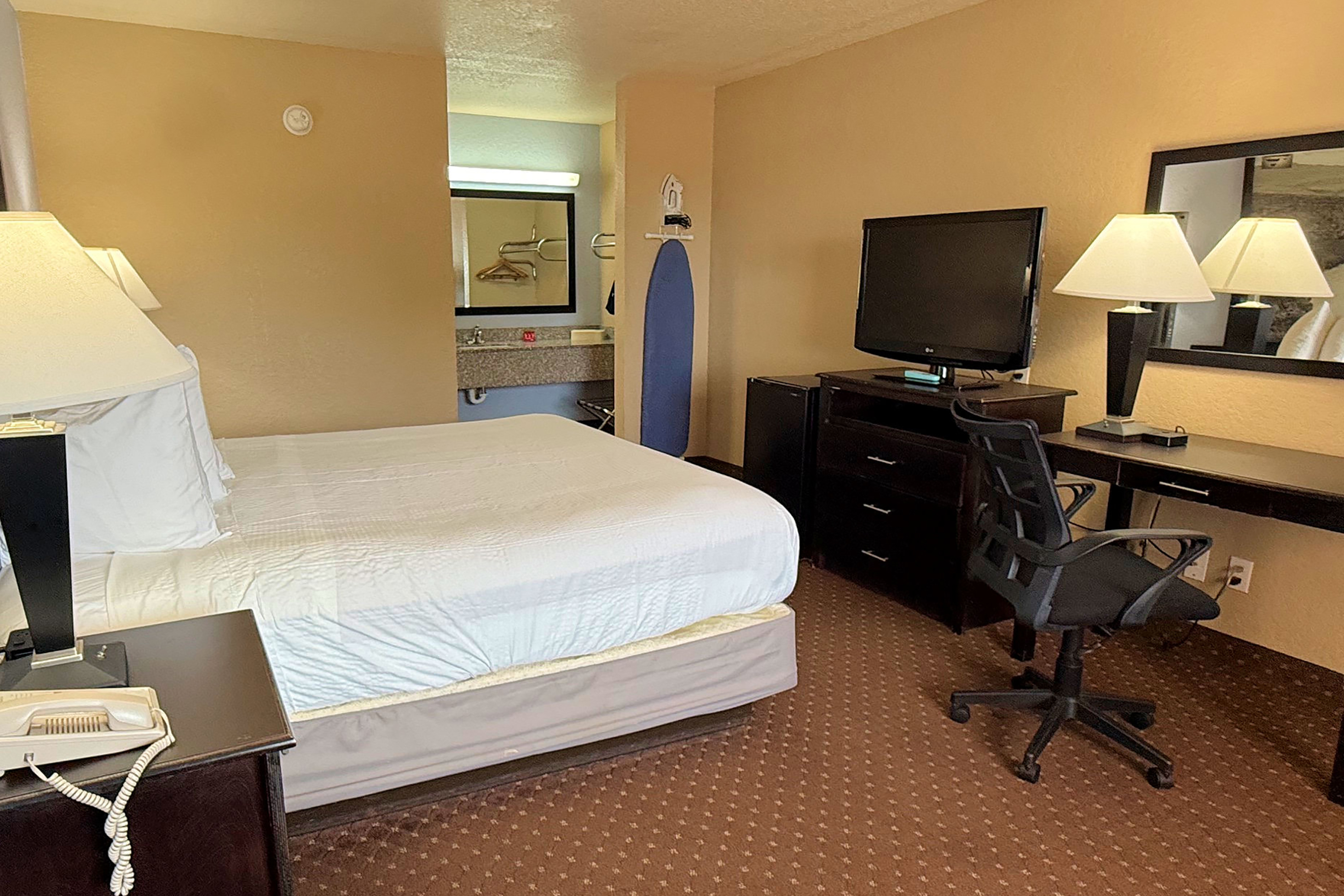 Guest room at the Baymont by Wyndham New Braunfels TX in New Braunfels, Texas