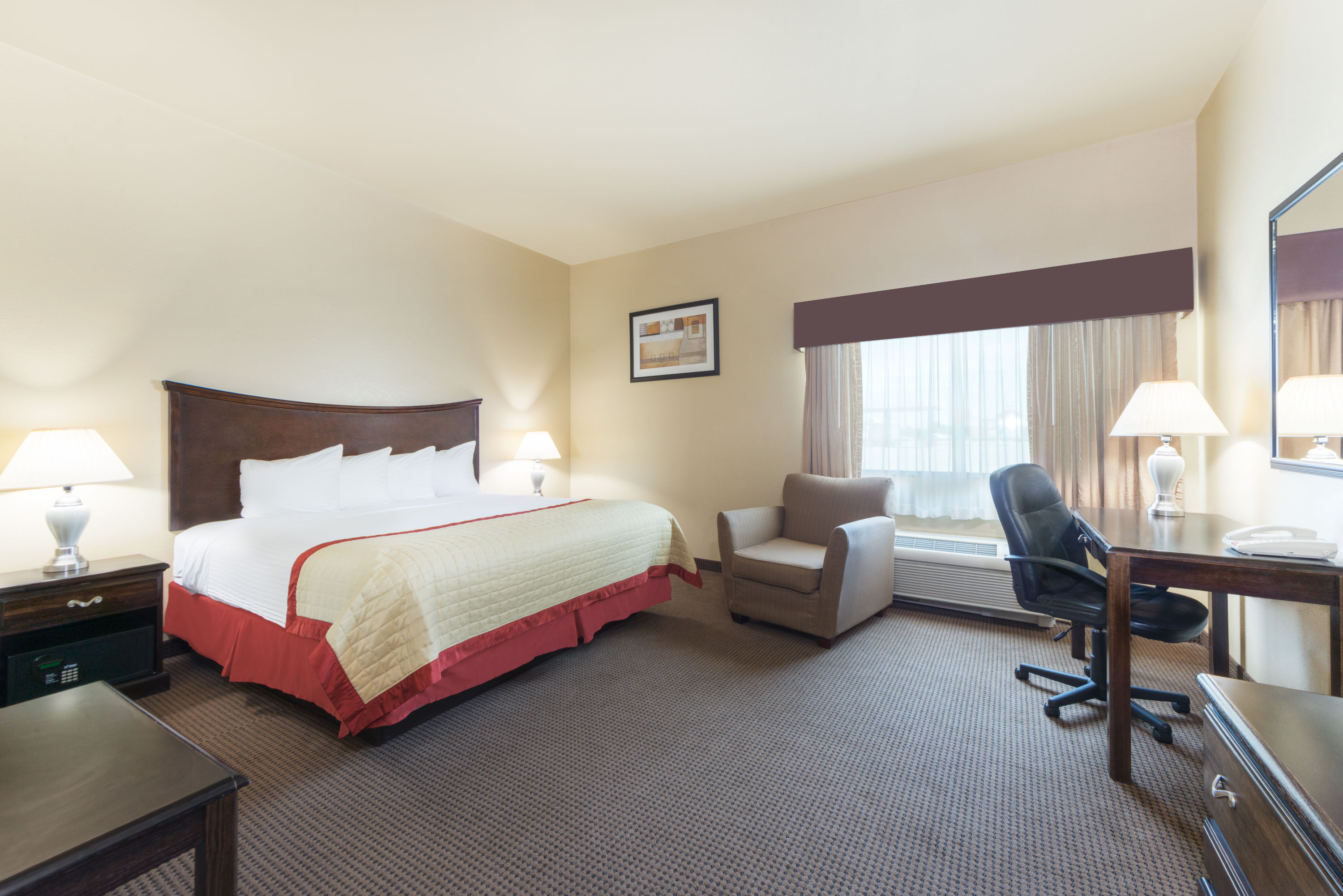 Guest room at the Baymont by Wyndham Perryton in Perryton, Texas