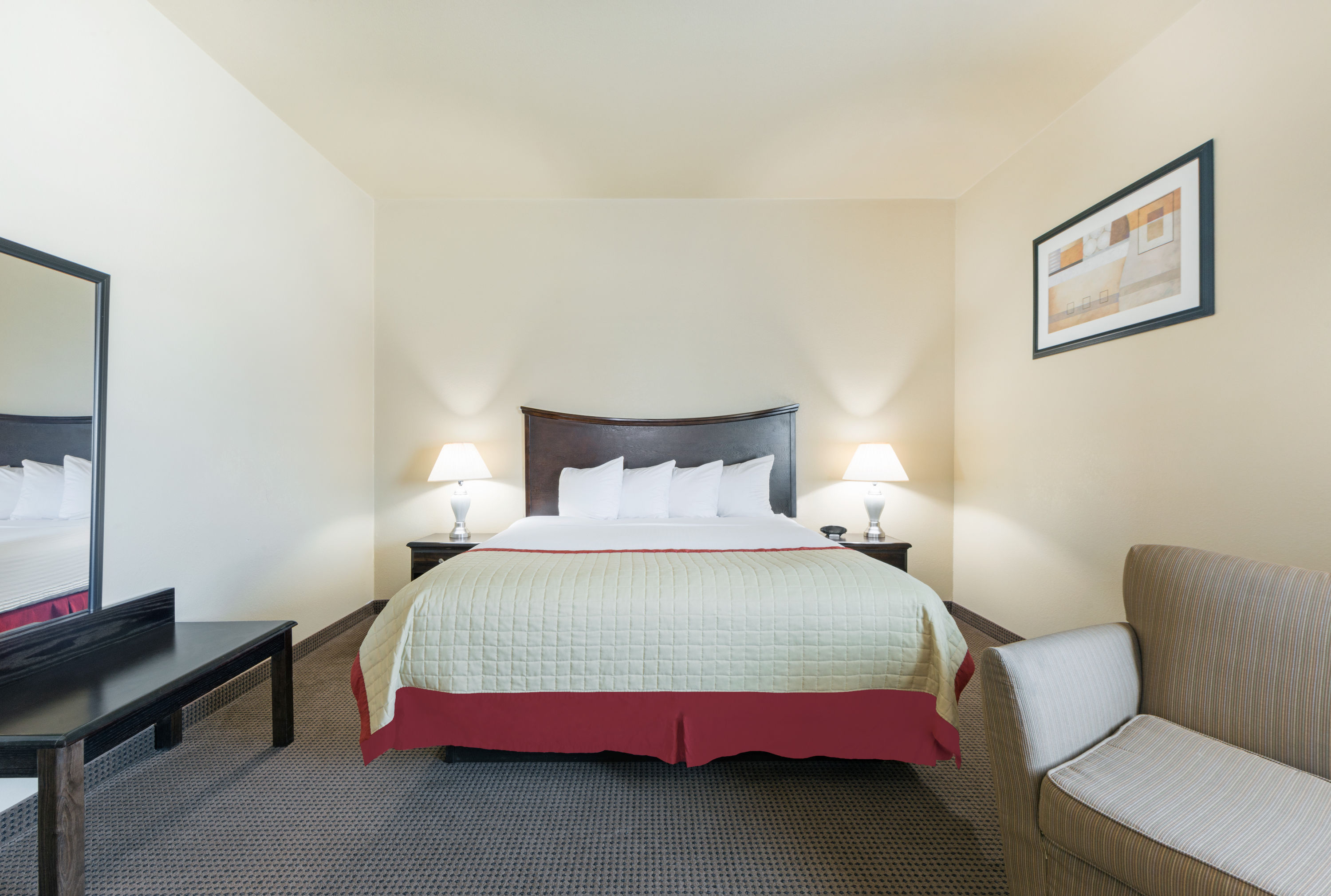 Guest room at the Baymont by Wyndham Perryton in Perryton, Texas