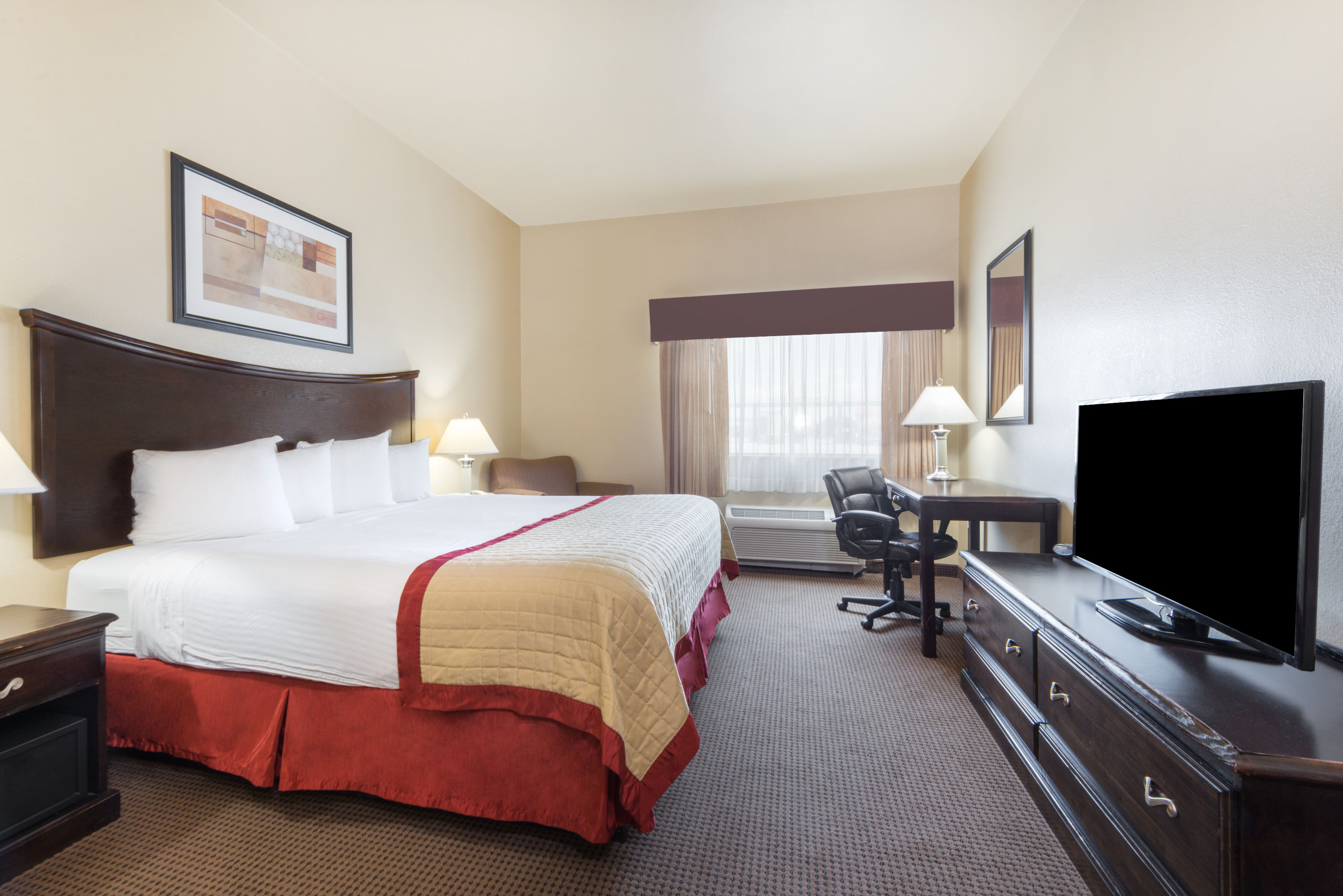 Guest room at the Baymont by Wyndham Perryton in Perryton, Texas