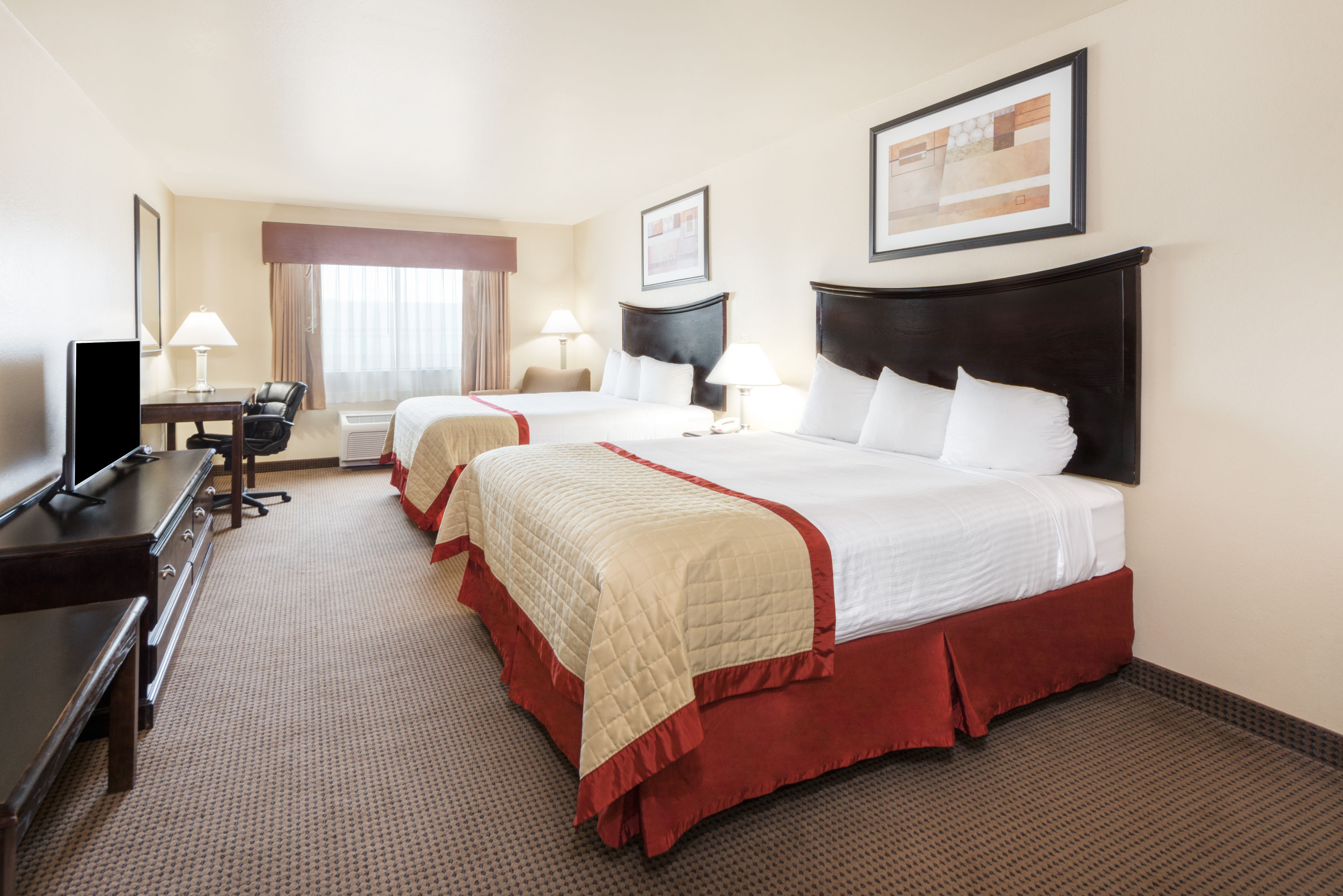 Guest room at the Baymont by Wyndham Perryton in Perryton, Texas