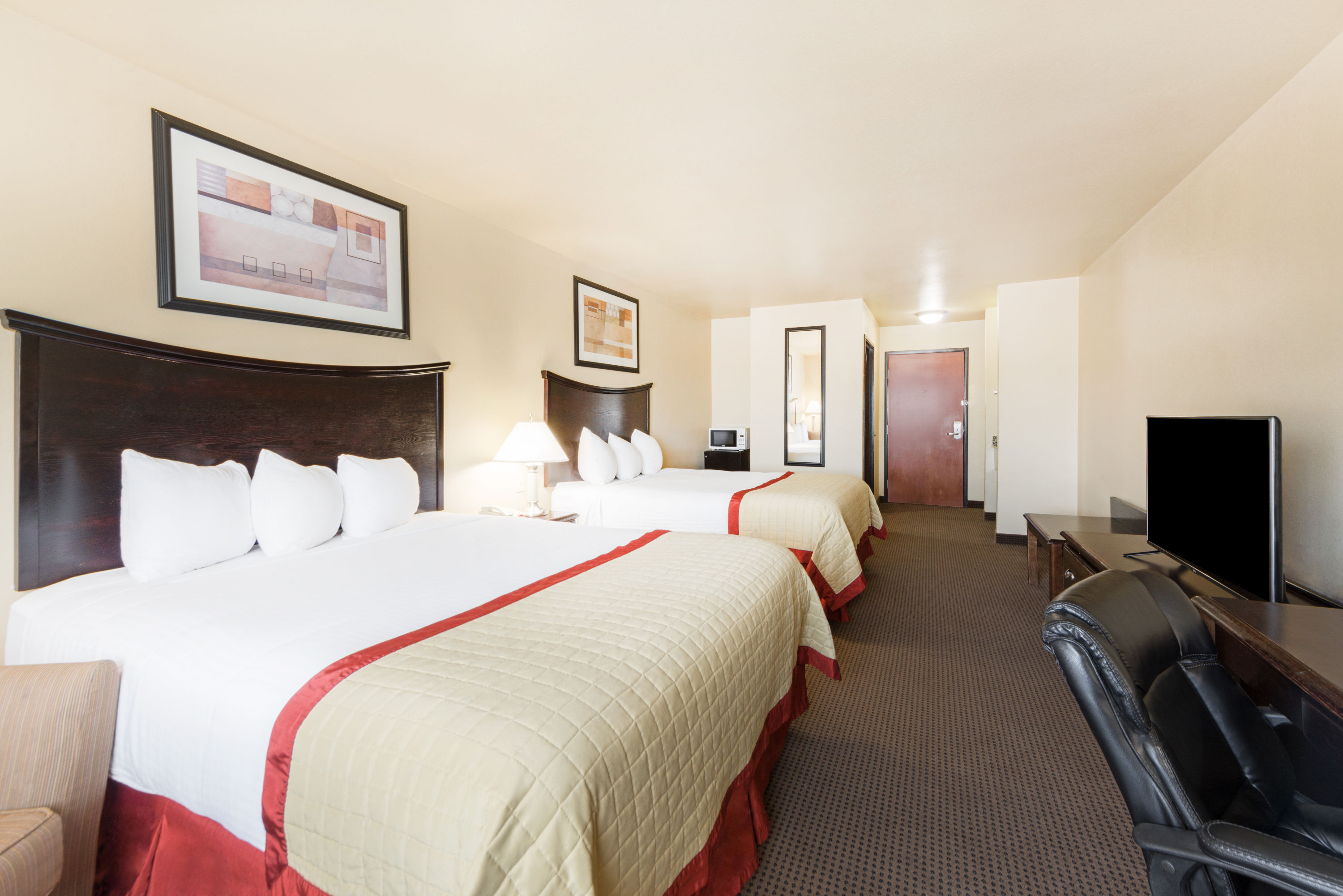 Guest room at the Baymont by Wyndham Perryton in Perryton, Texas