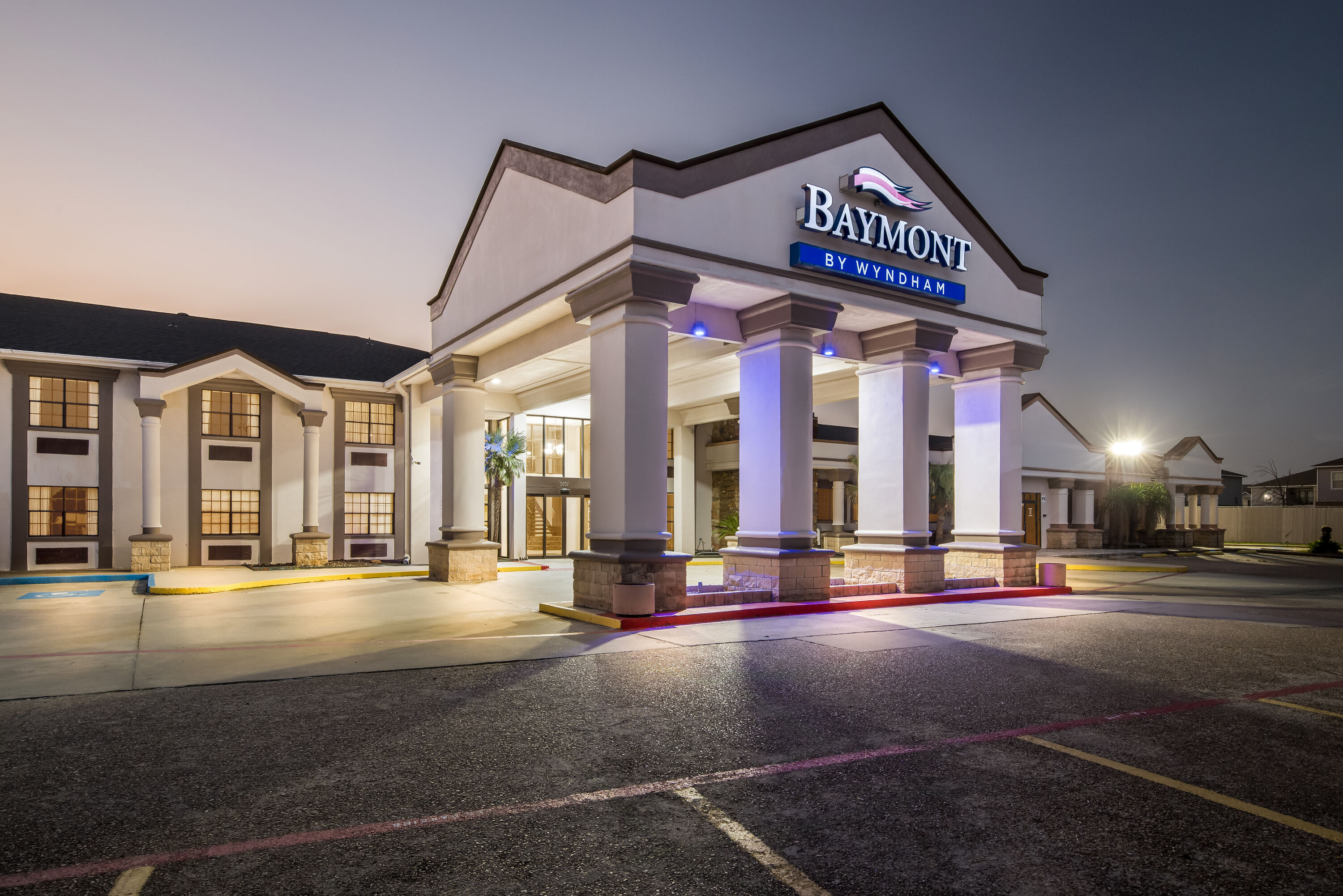 Exterior Night Image of Baymont by Wyndham Port Arthur/Groves Area hotel in Port Arthur, Texas
