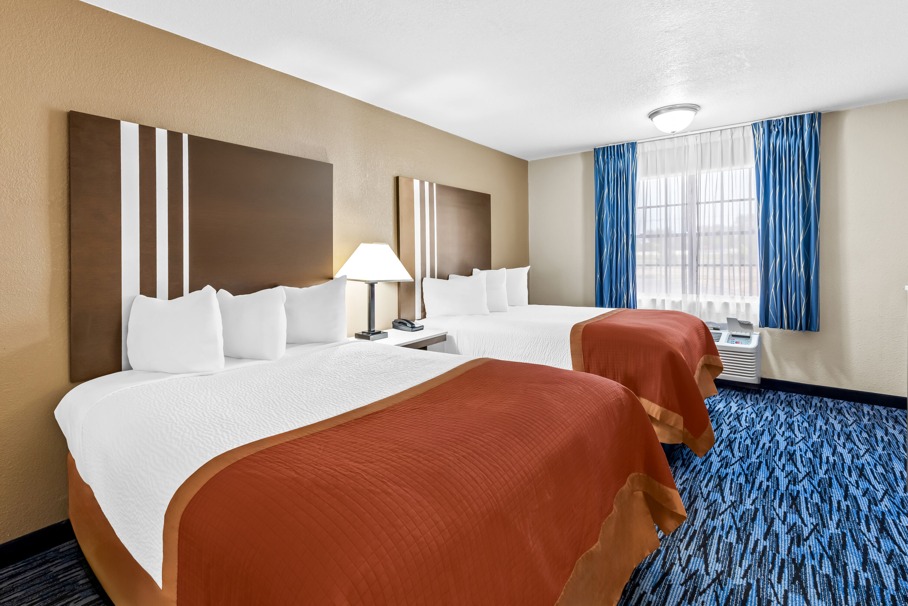 Double bed guest room at the Baymont by Wyndham Port Arthur/Groves Area in Port Arthur, Texas