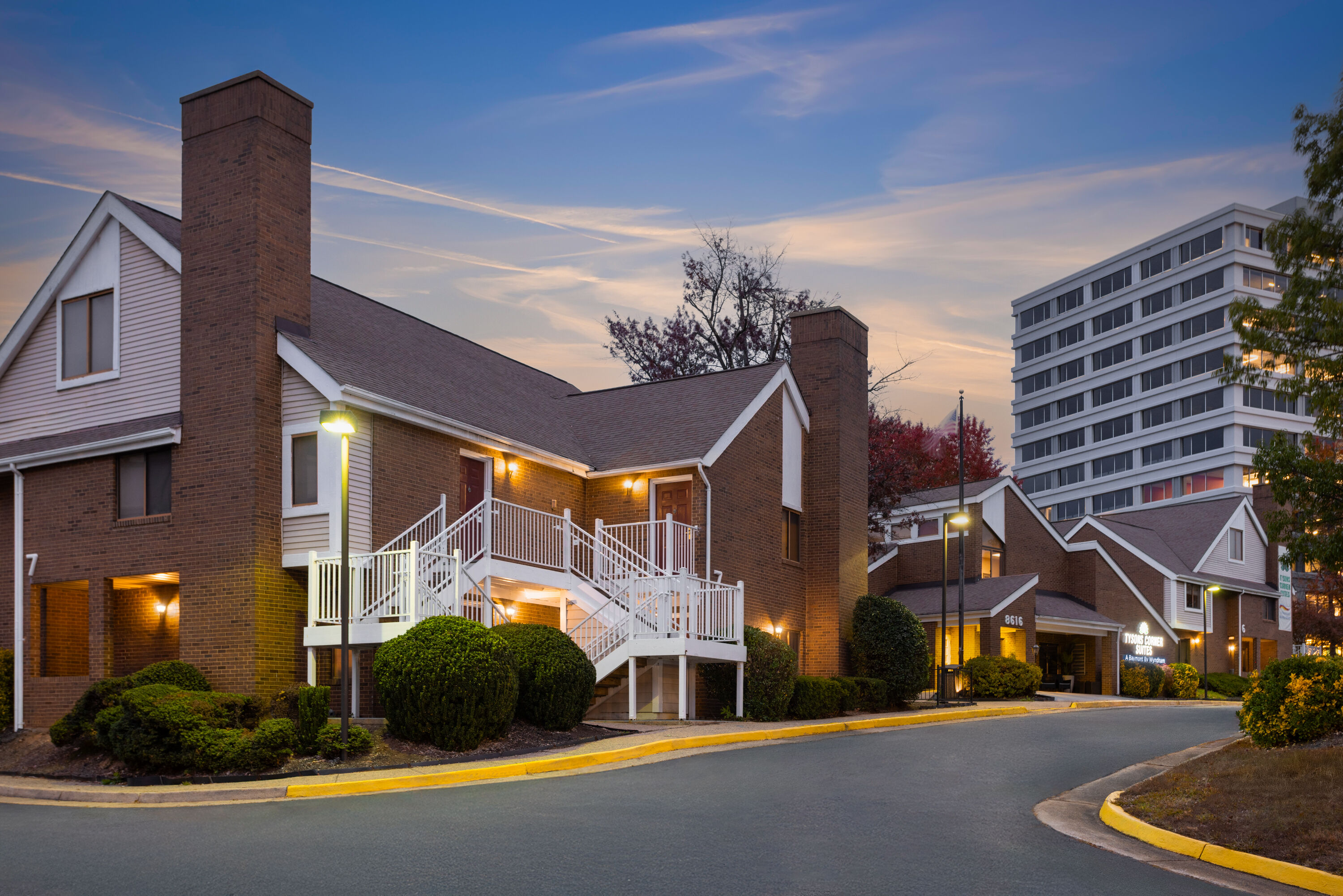 Exterior Dusk Image of Tysons Corner Suites, a Baymont by Wyndham hotel in Vienna, Virginia