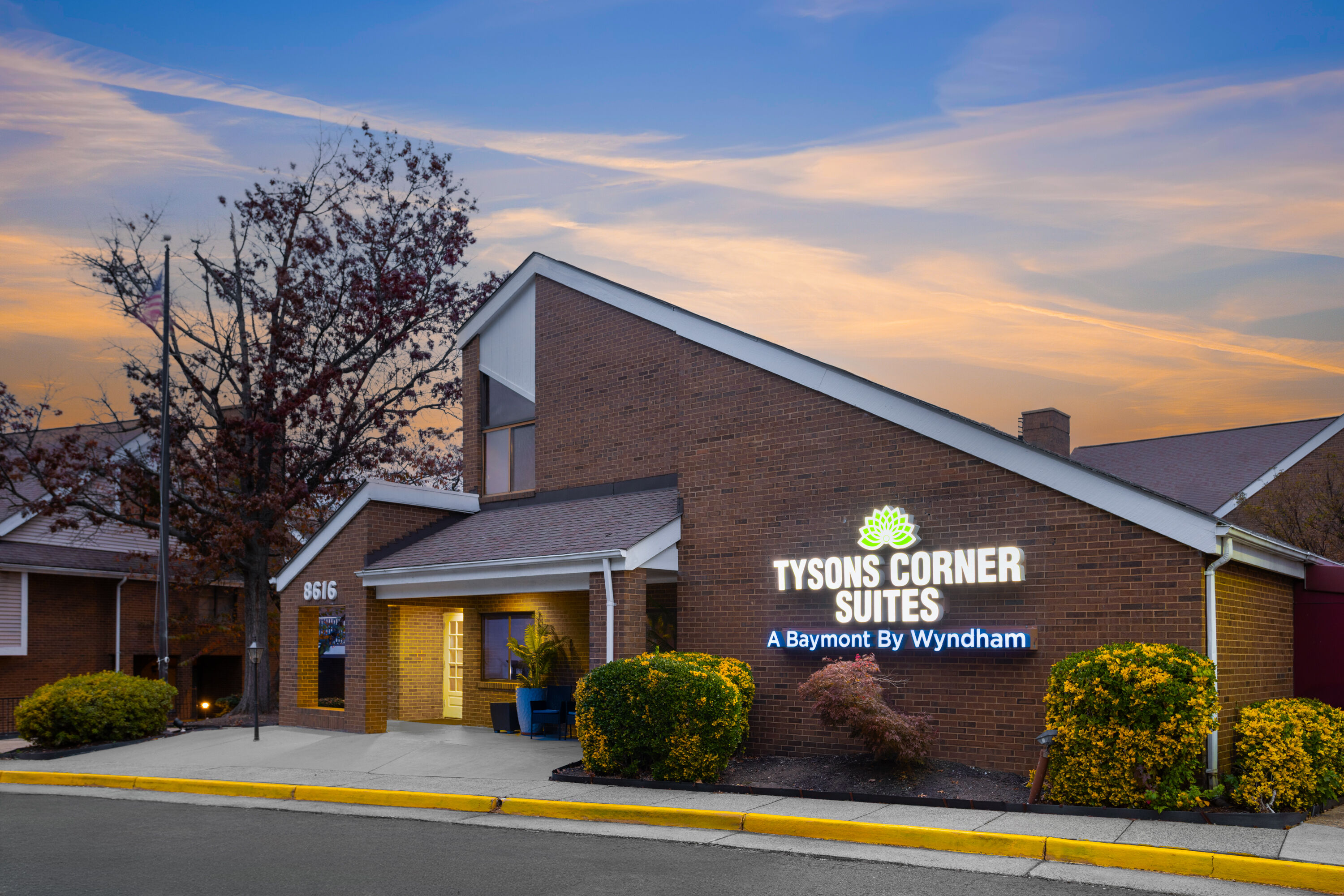 Exterior Dusk Image of Tysons Corner Suites, a Baymont by Wyndham hotel in Vienna, Virginia