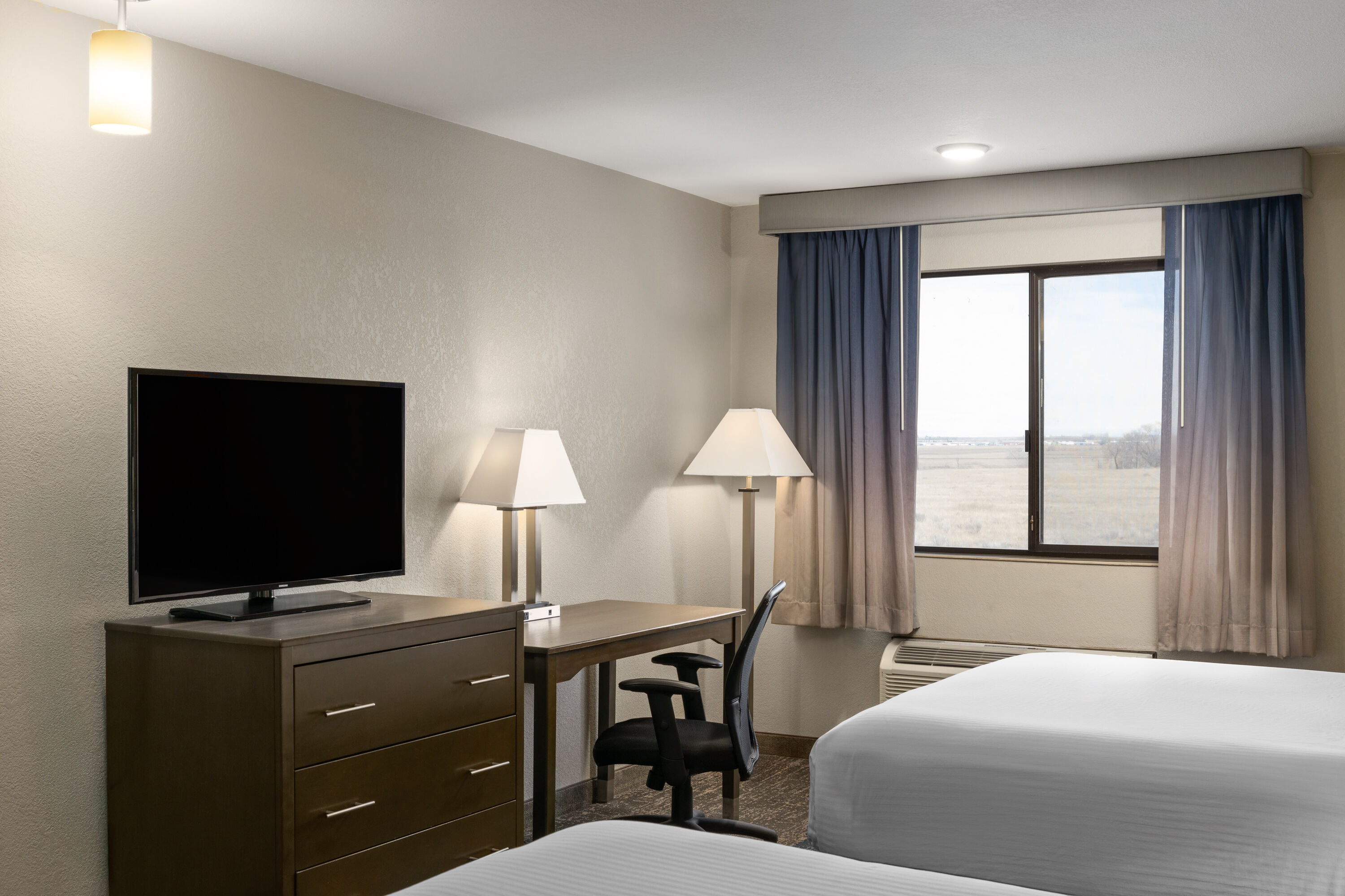 Guest room at the Baymont by Wyndham Moses Lake in Moses Lake, Washington