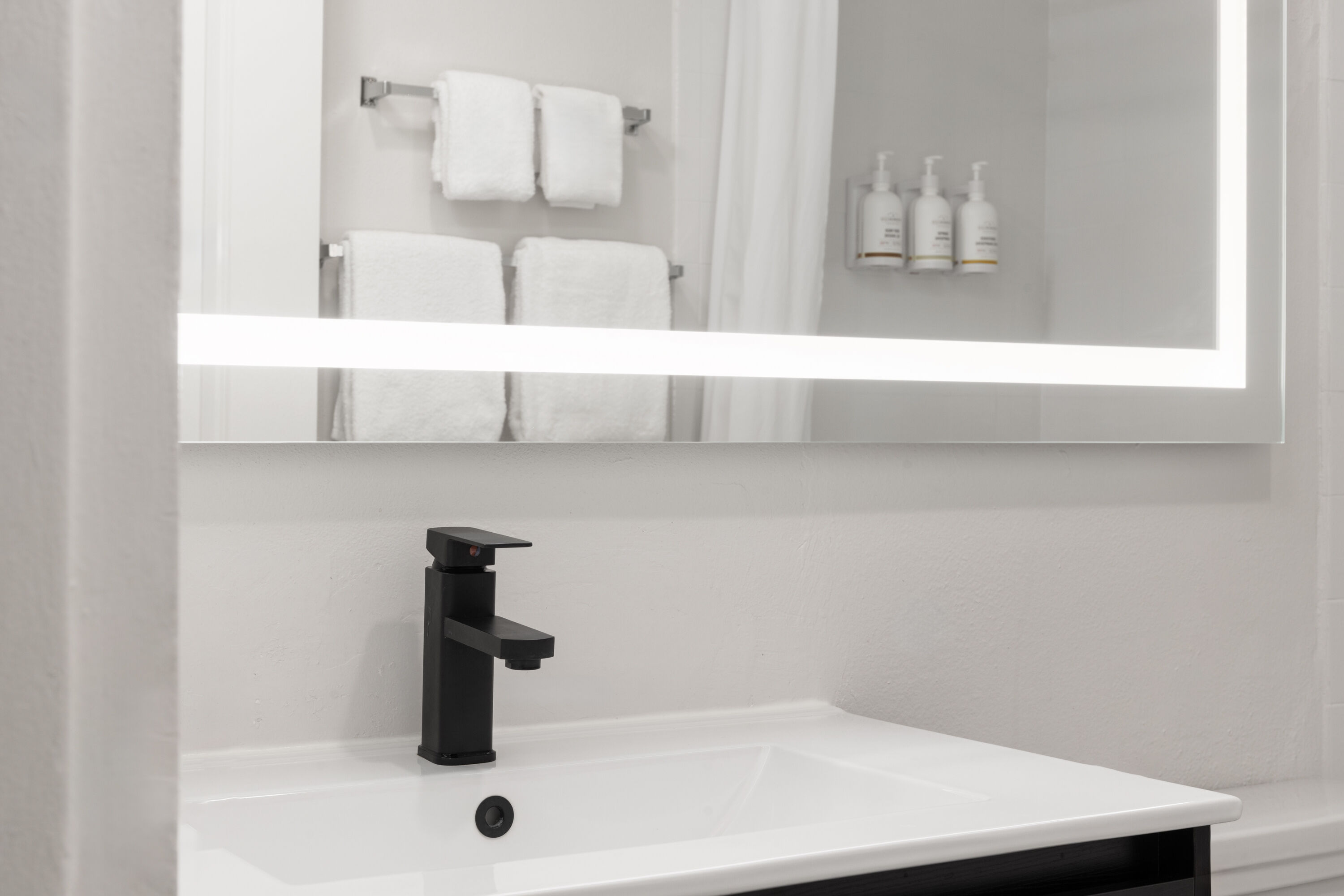 Guest room bath at the The Dylan, a Baymont by Wyndham in Seattle, Washington