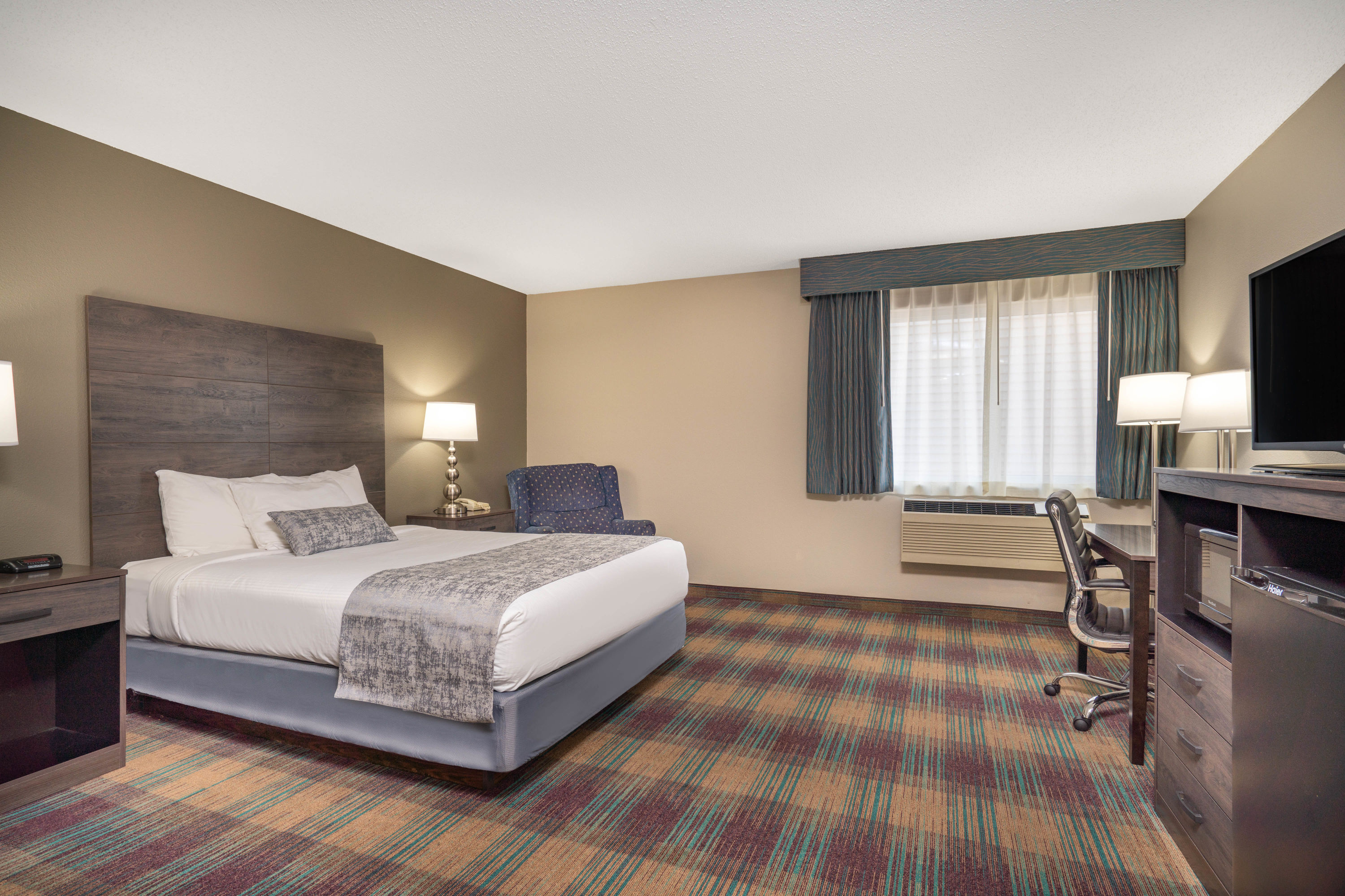 Guest room at the Baymont by Wyndham Baldwin in Baldwin, Wisconsin