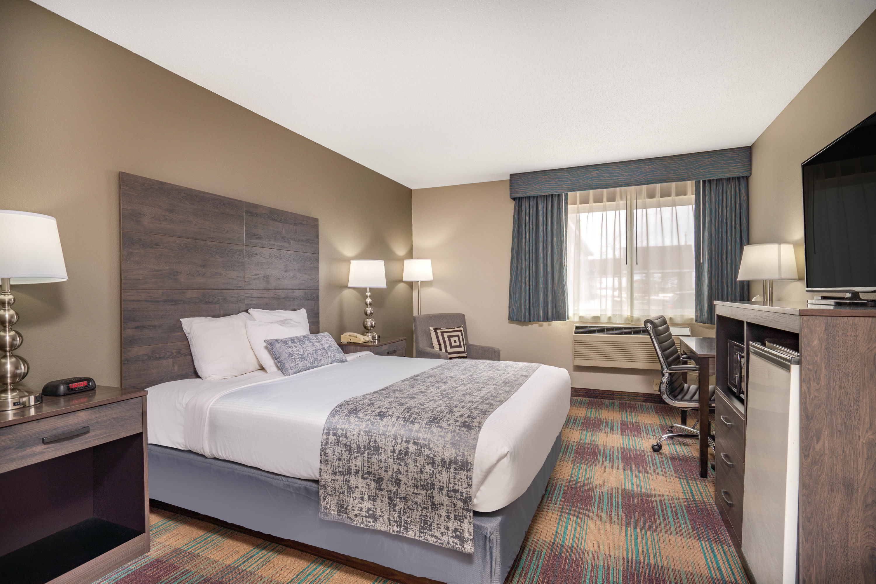 Guest room at the Baymont by Wyndham Baldwin in Baldwin, Wisconsin