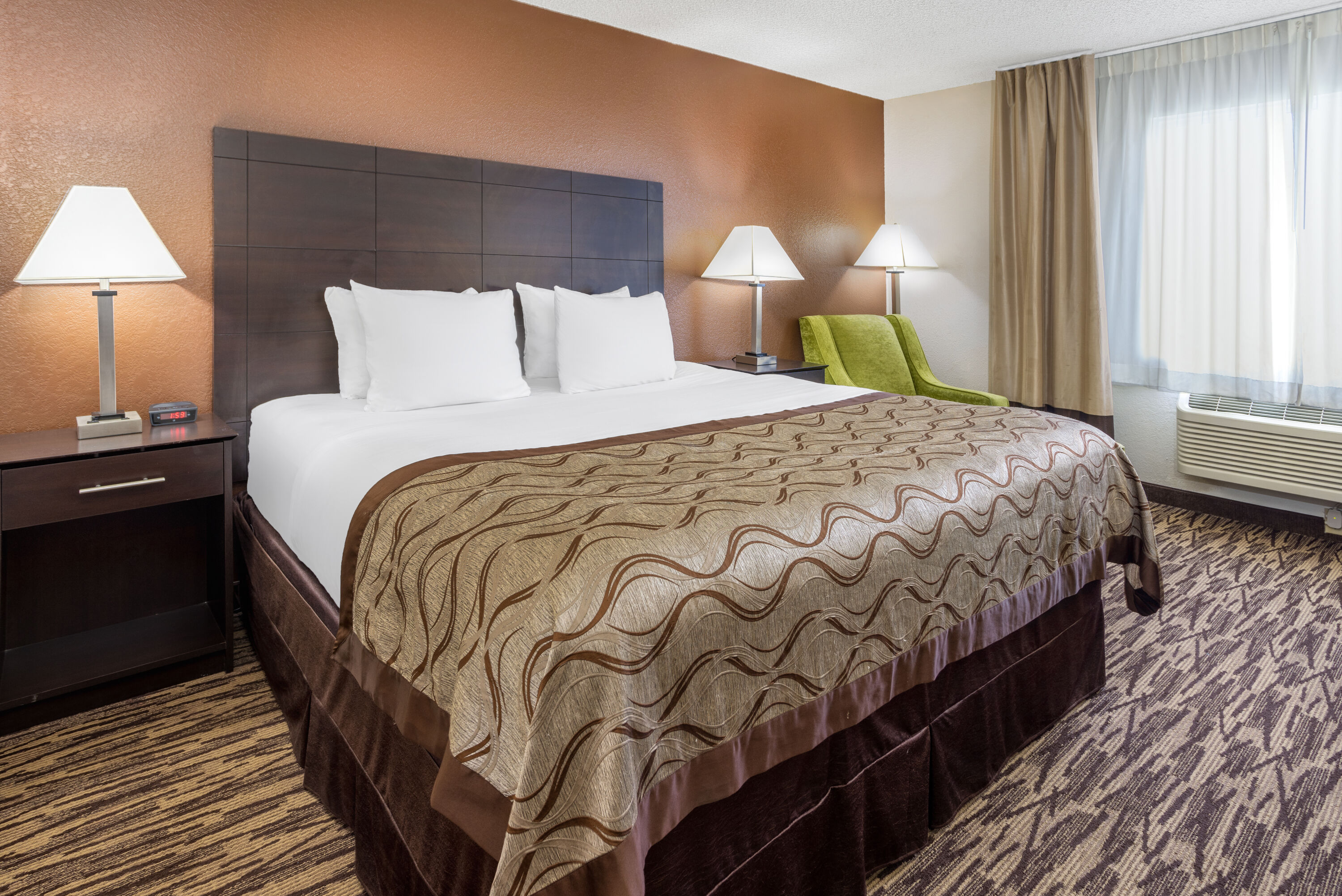 Guest room at the Baymont by Wyndham Beloit in Beloit, Wisconsin