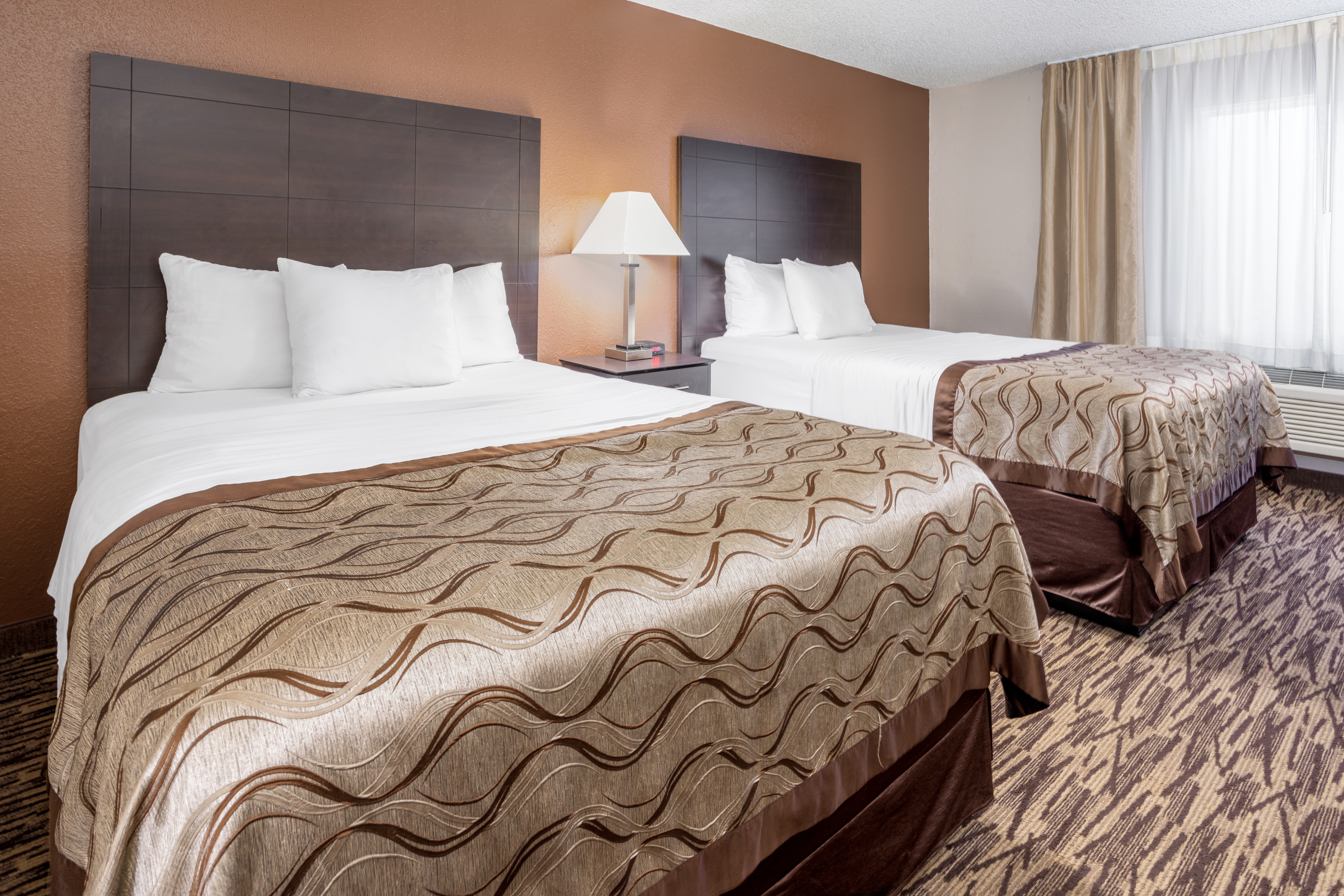 Guest room at the Baymont by Wyndham Beloit in Beloit, Wisconsin