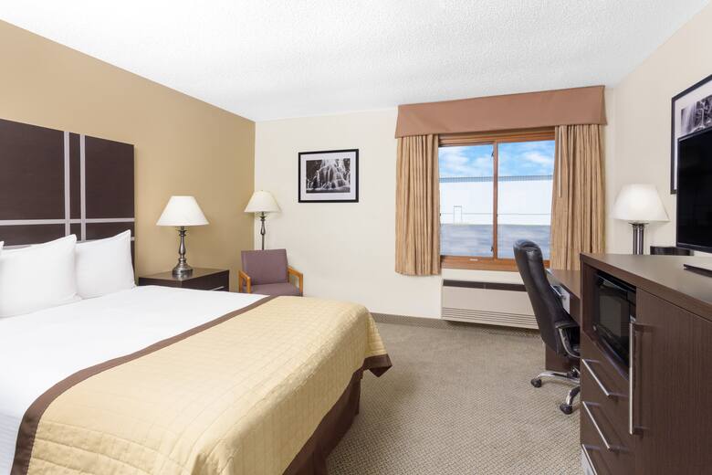 Guest room at the Baymont Inn & Suites Green Bay in Green Bay, Wisconsin