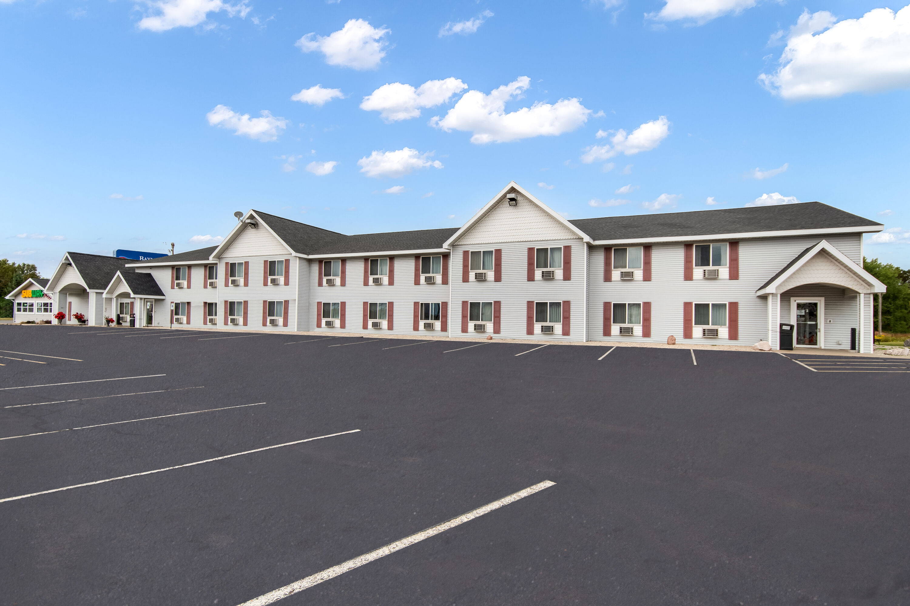 Exterior Day Image of Baymont by Wyndham Marinette hotel in Marinette, Wisconsin