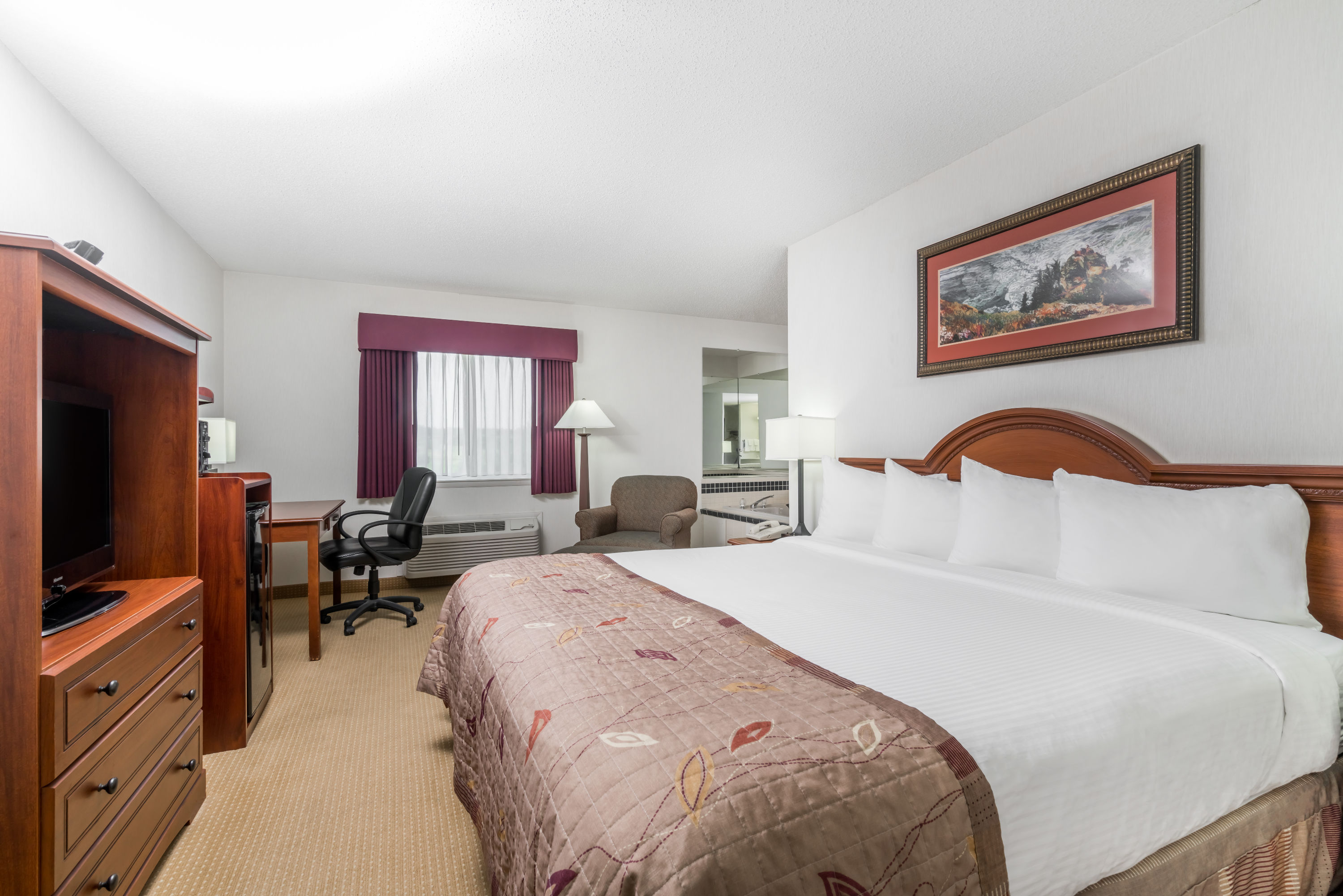 Baymont by Wyndham Marshfield suite in Marshfield, Wisconsin
