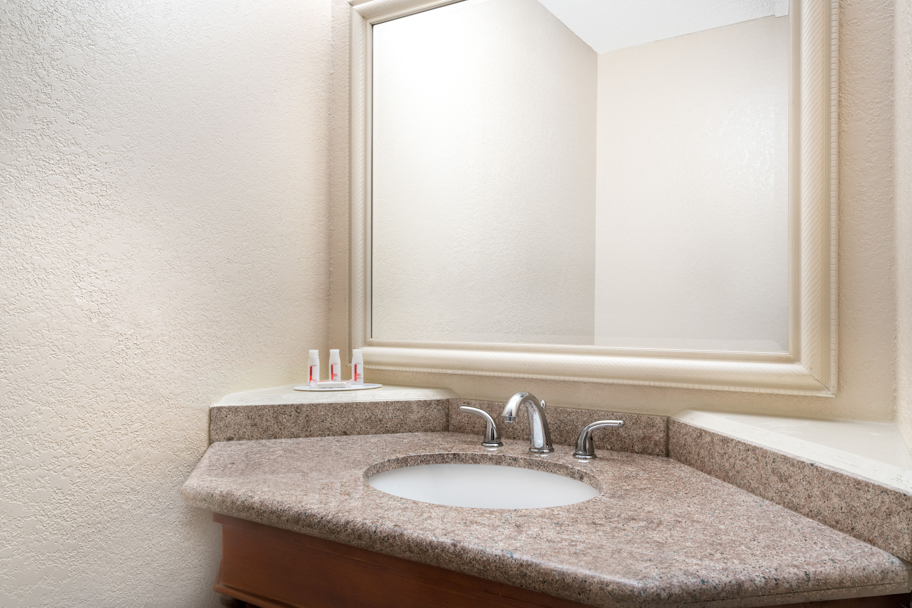 Guest room bath at the Baymont by Wyndham Stevens Point in Stevens Point, Wisconsin