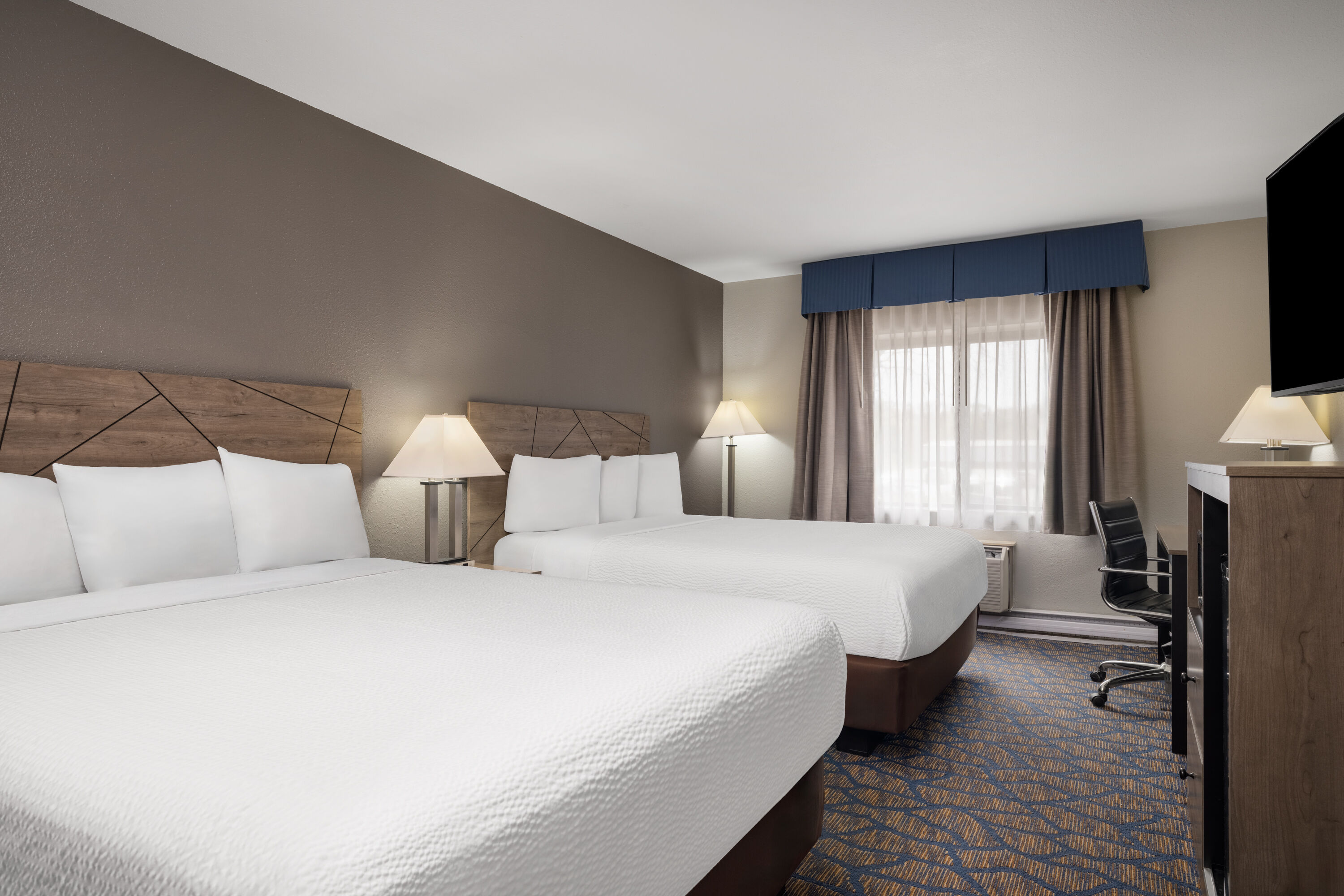 Guest room at the Baymont by Wyndham Waukesha in Waukesha, Wisconsin