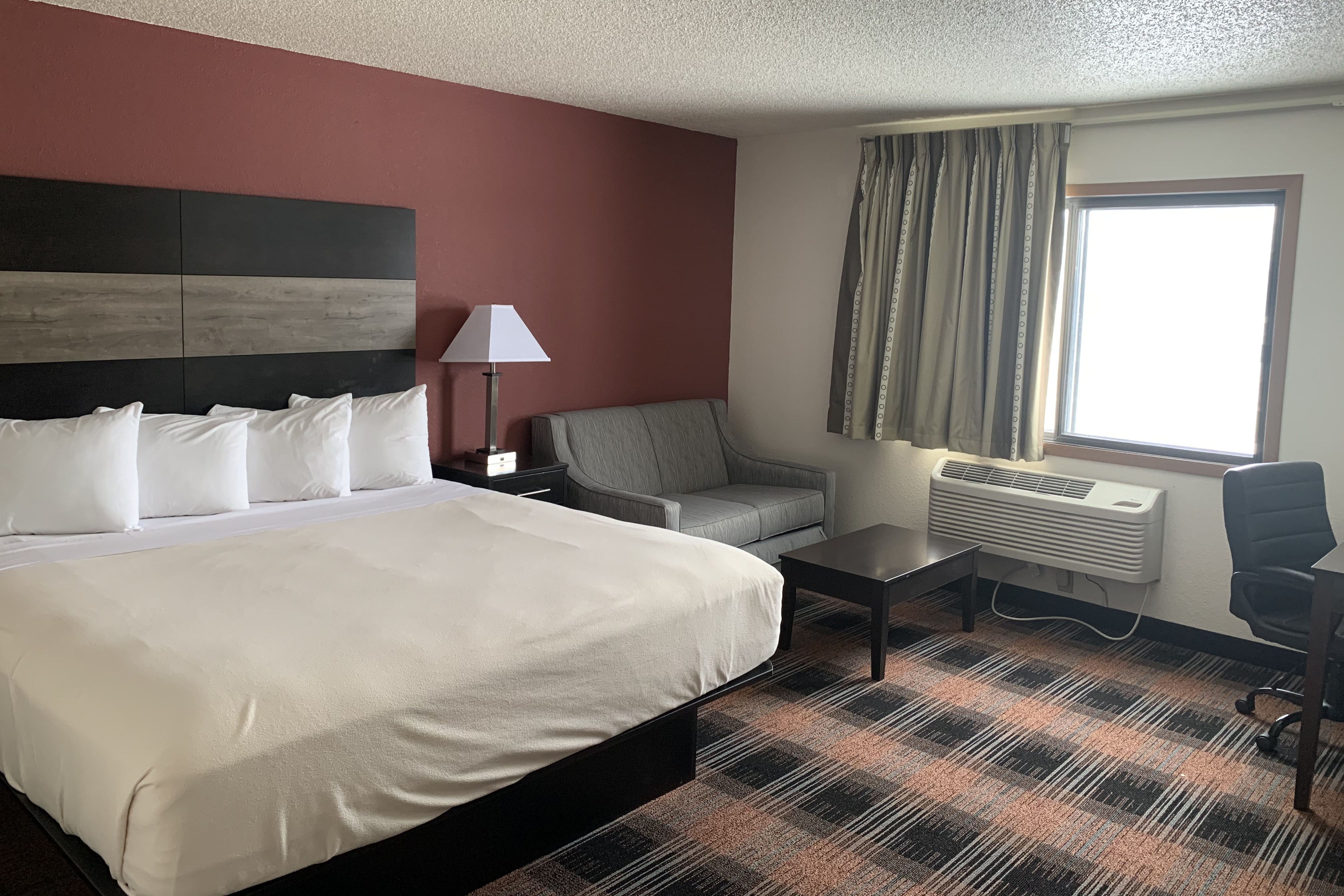 Guest room at the Baymont by Wyndham Waupun in Waupun, Wisconsin