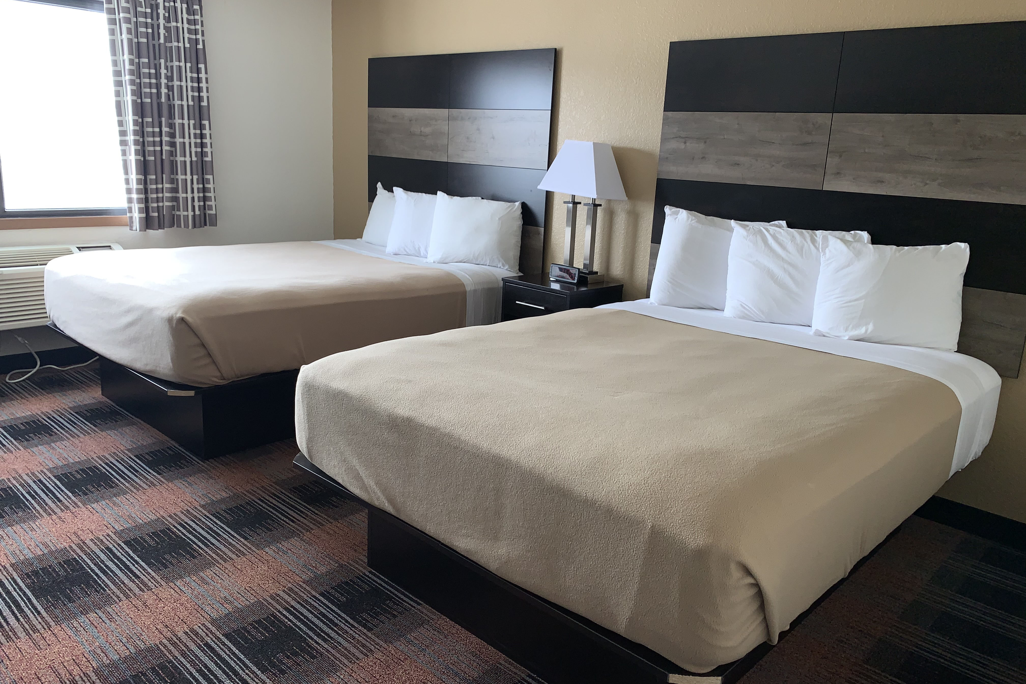 Guest room at the Baymont by Wyndham Waupun in Waupun, Wisconsin