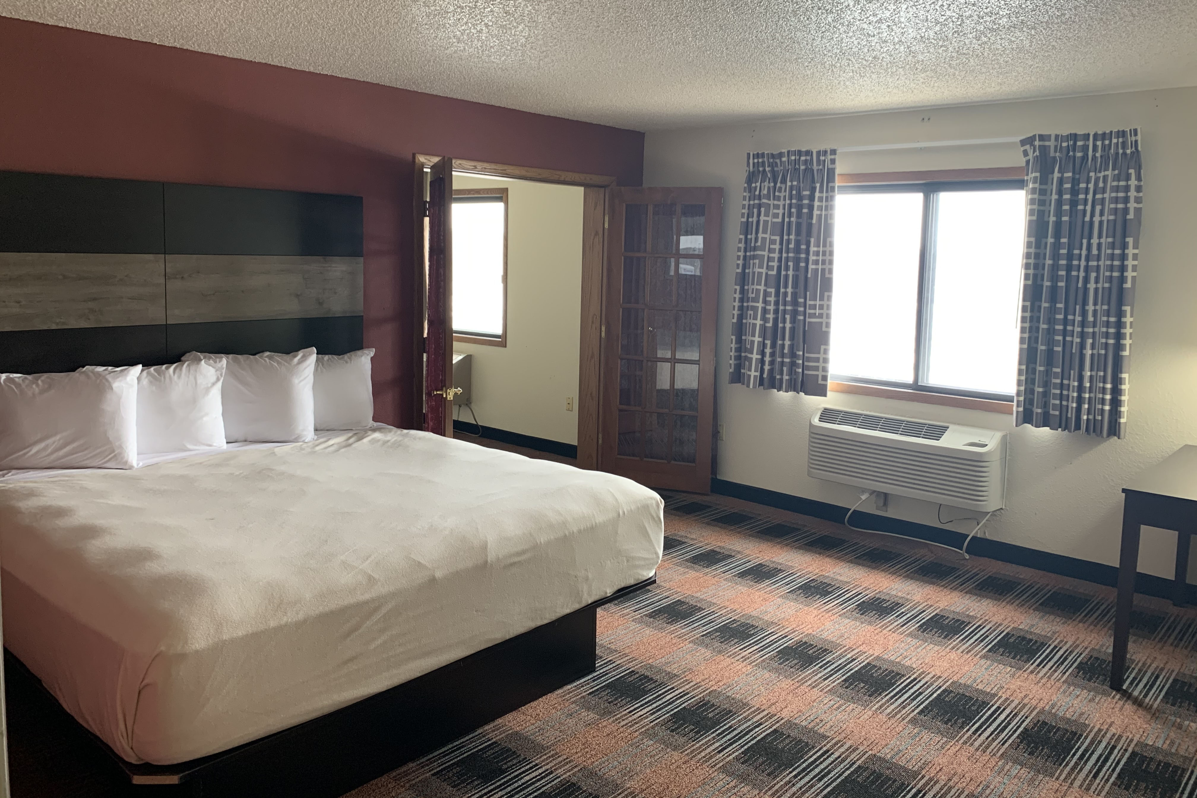 Guest room at the Baymont by Wyndham Waupun in Waupun, Wisconsin