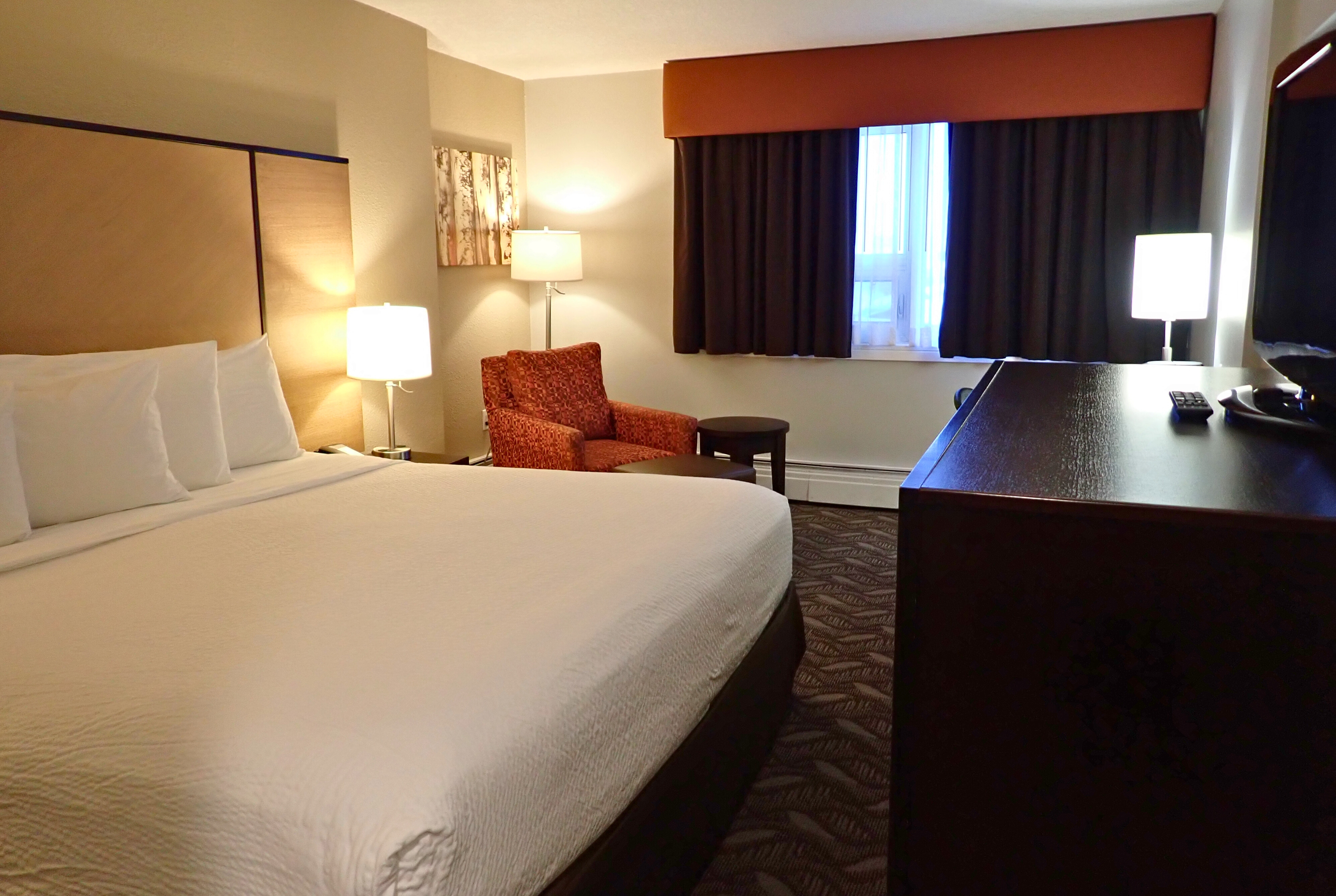 Guest room at the Days Inn by Wyndham Airdrie in Airdrie, Alberta