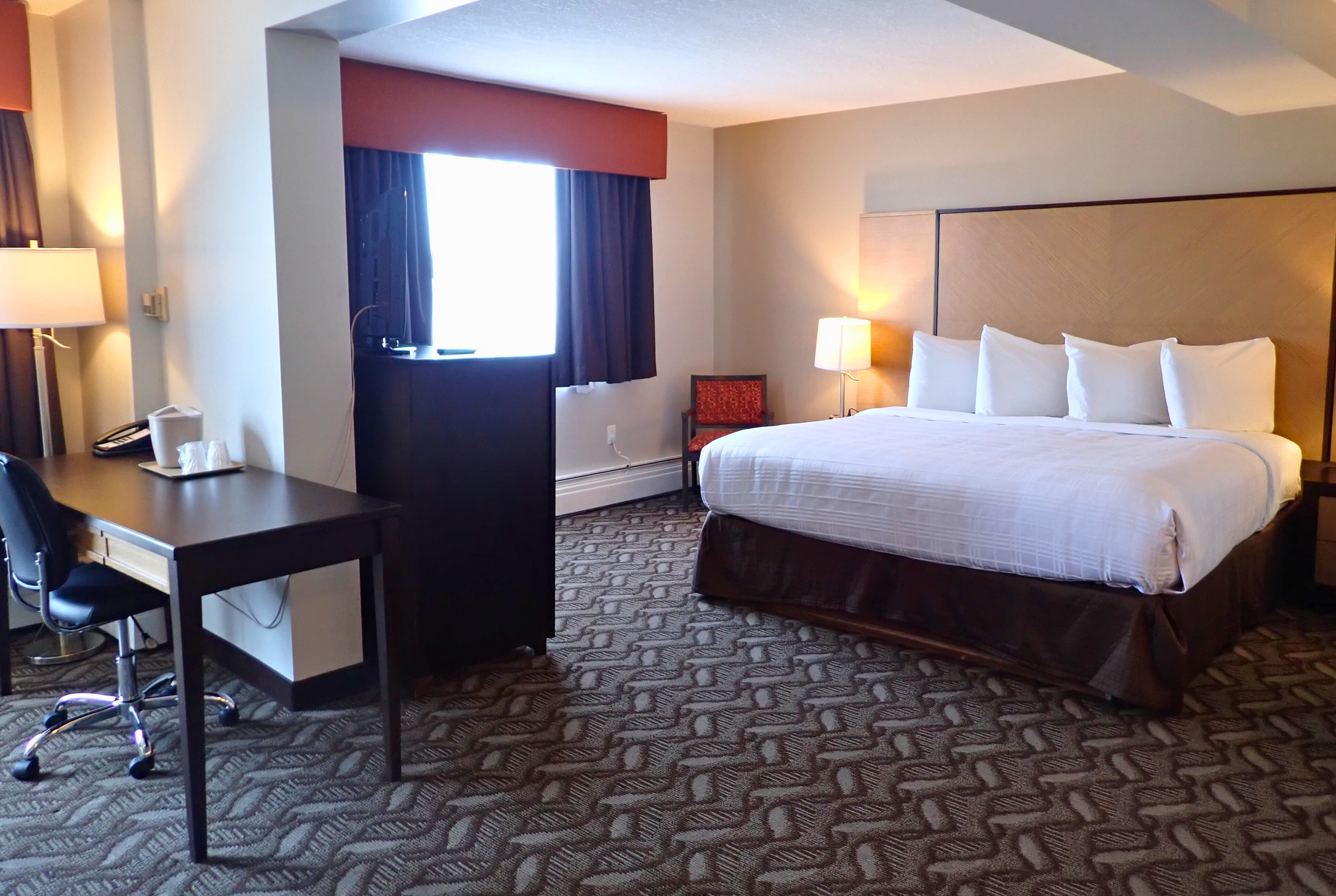 Guest room at the Days Inn by Wyndham Airdrie in Airdrie, Alberta