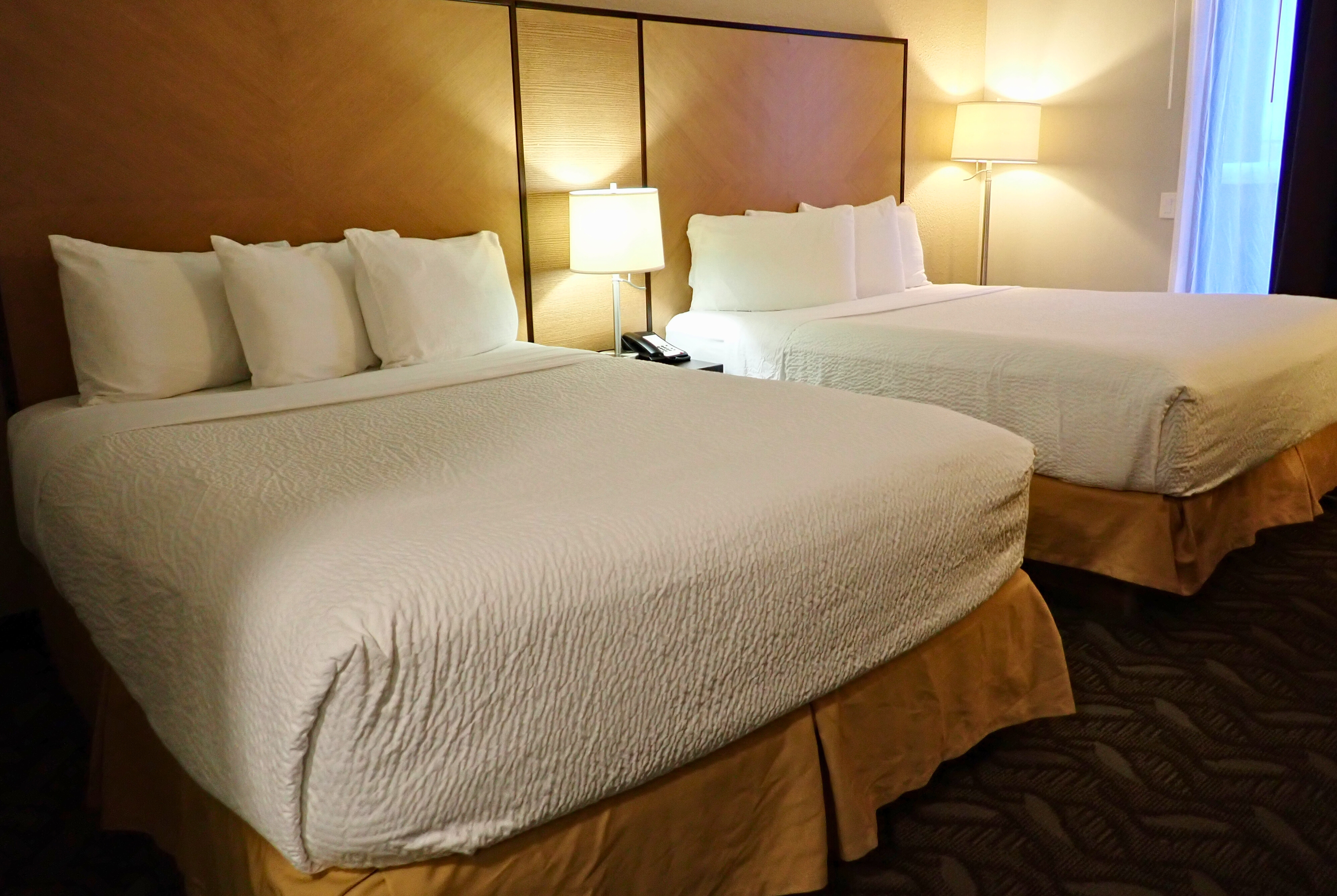 Guest room at the Days Inn by Wyndham Airdrie in Airdrie, Alberta
