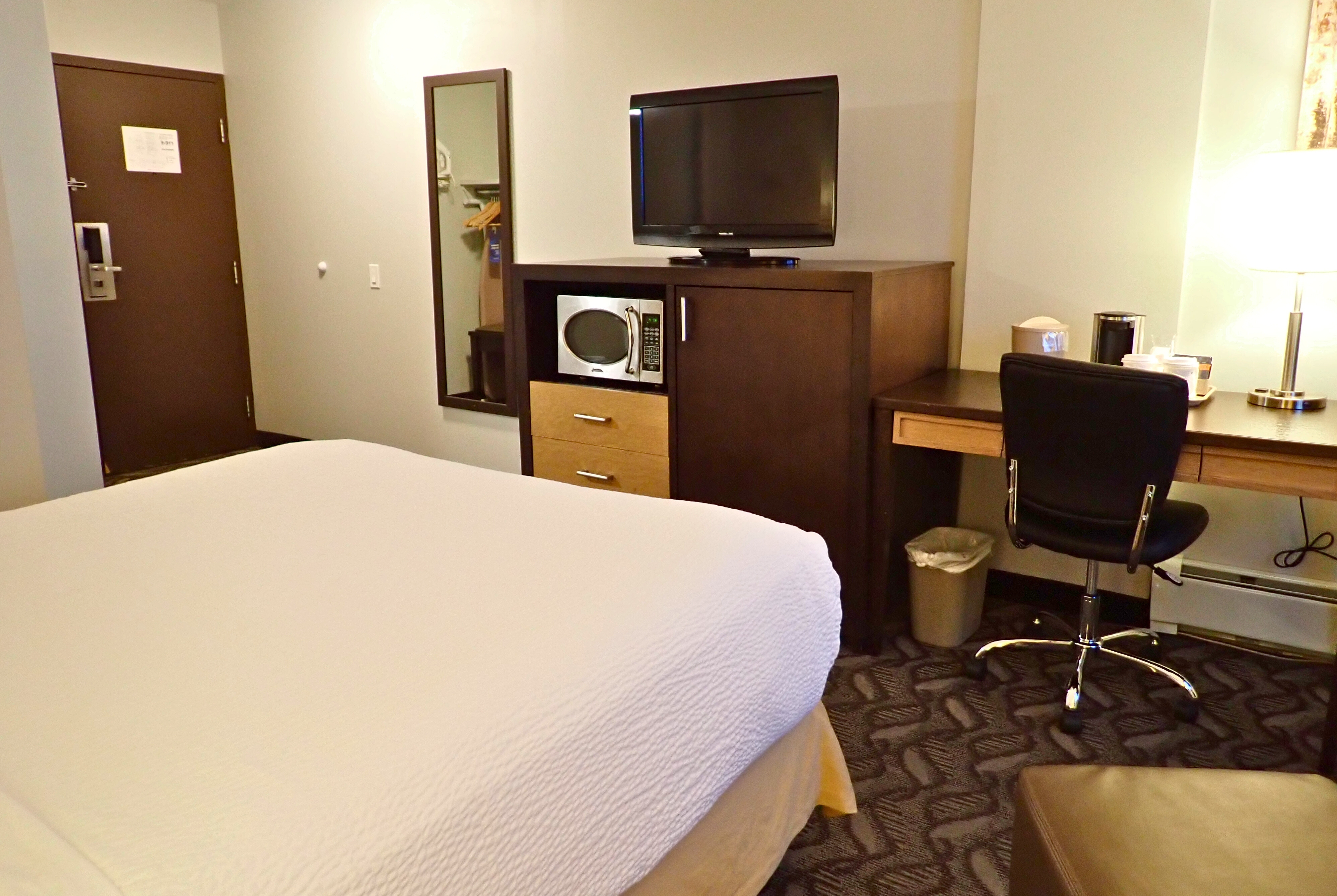 Guest room at the Days Inn by Wyndham Airdrie in Airdrie, Alberta