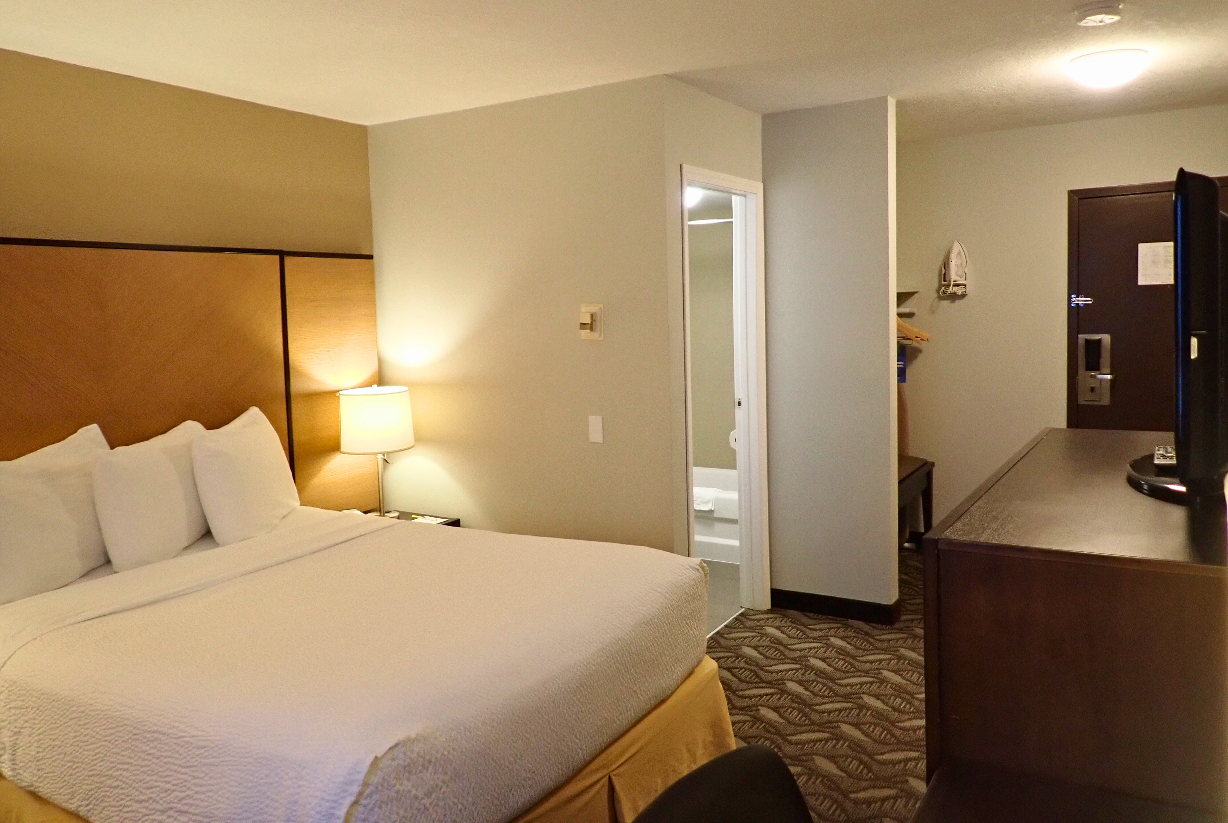 Guest room at the Days Inn by Wyndham Airdrie in Airdrie, Alberta