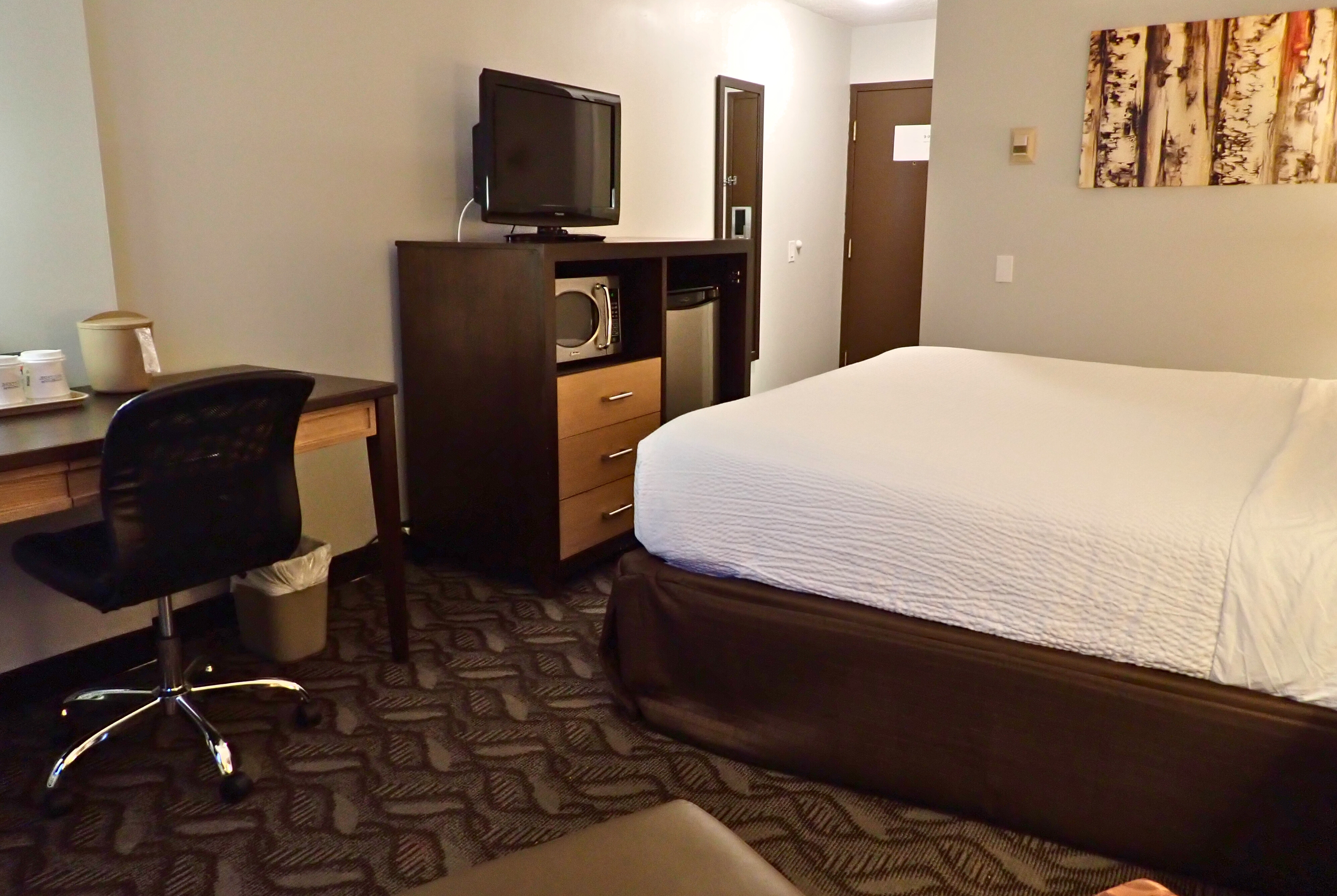 Guest room at the Days Inn by Wyndham Airdrie in Airdrie, Alberta