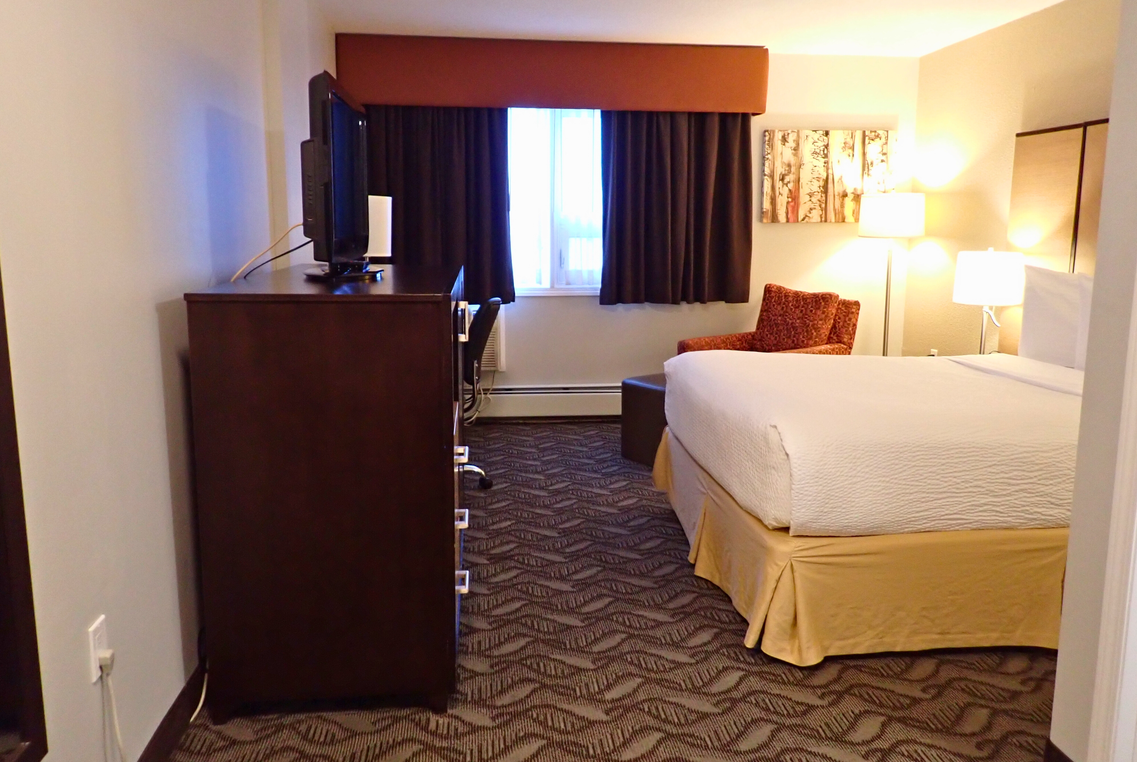 Guest room at the Days Inn by Wyndham Airdrie in Airdrie, Alberta