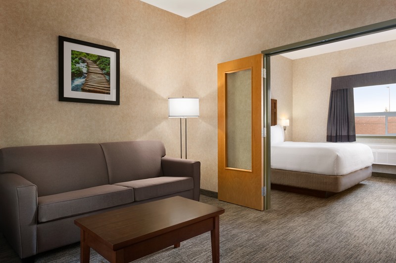 Guest room at the Days Inn & Suites by Wyndham Brooks in Brooks, Alberta