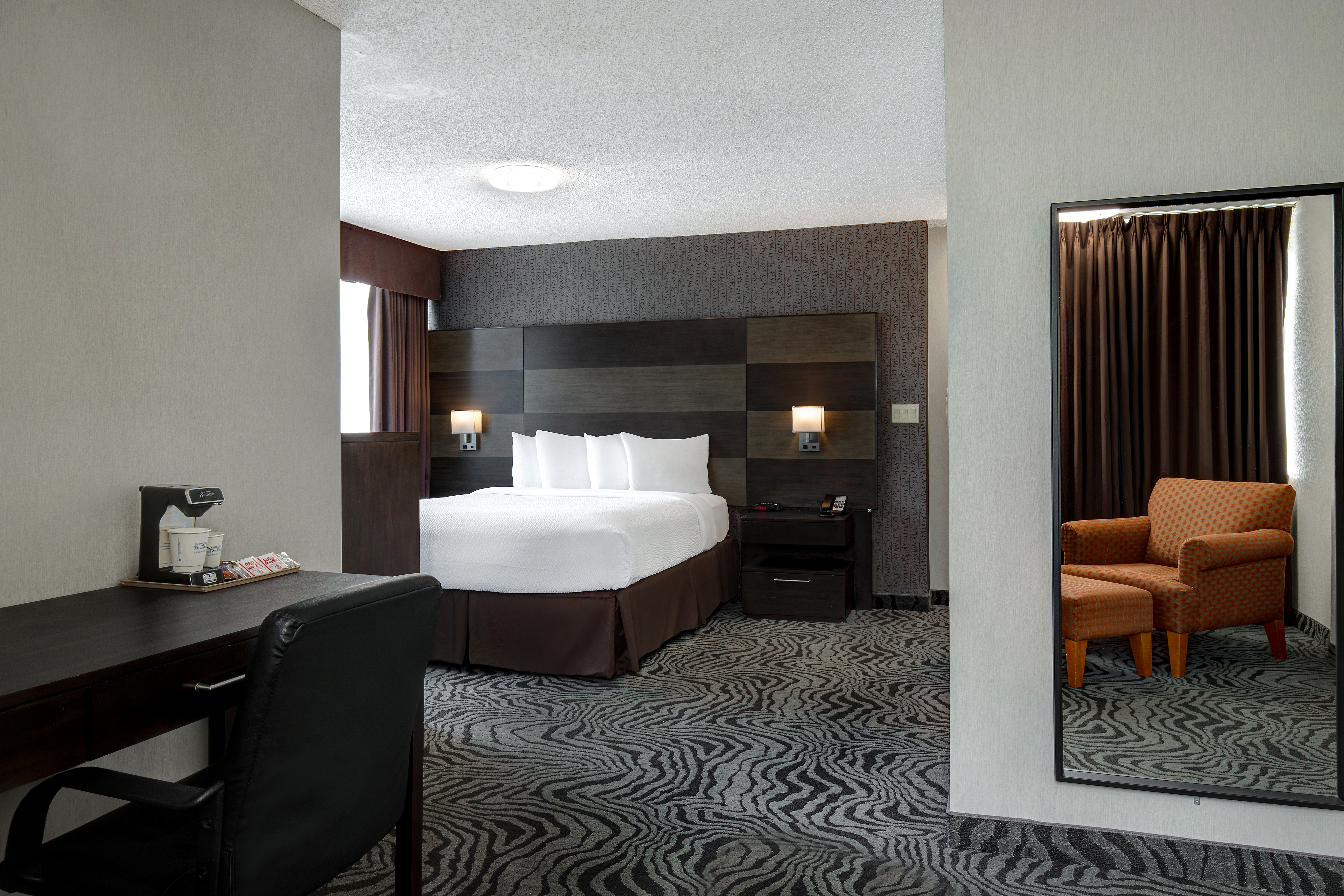 Guest room at the Days Inn by Wyndham Calgary South in Calgary, Alberta