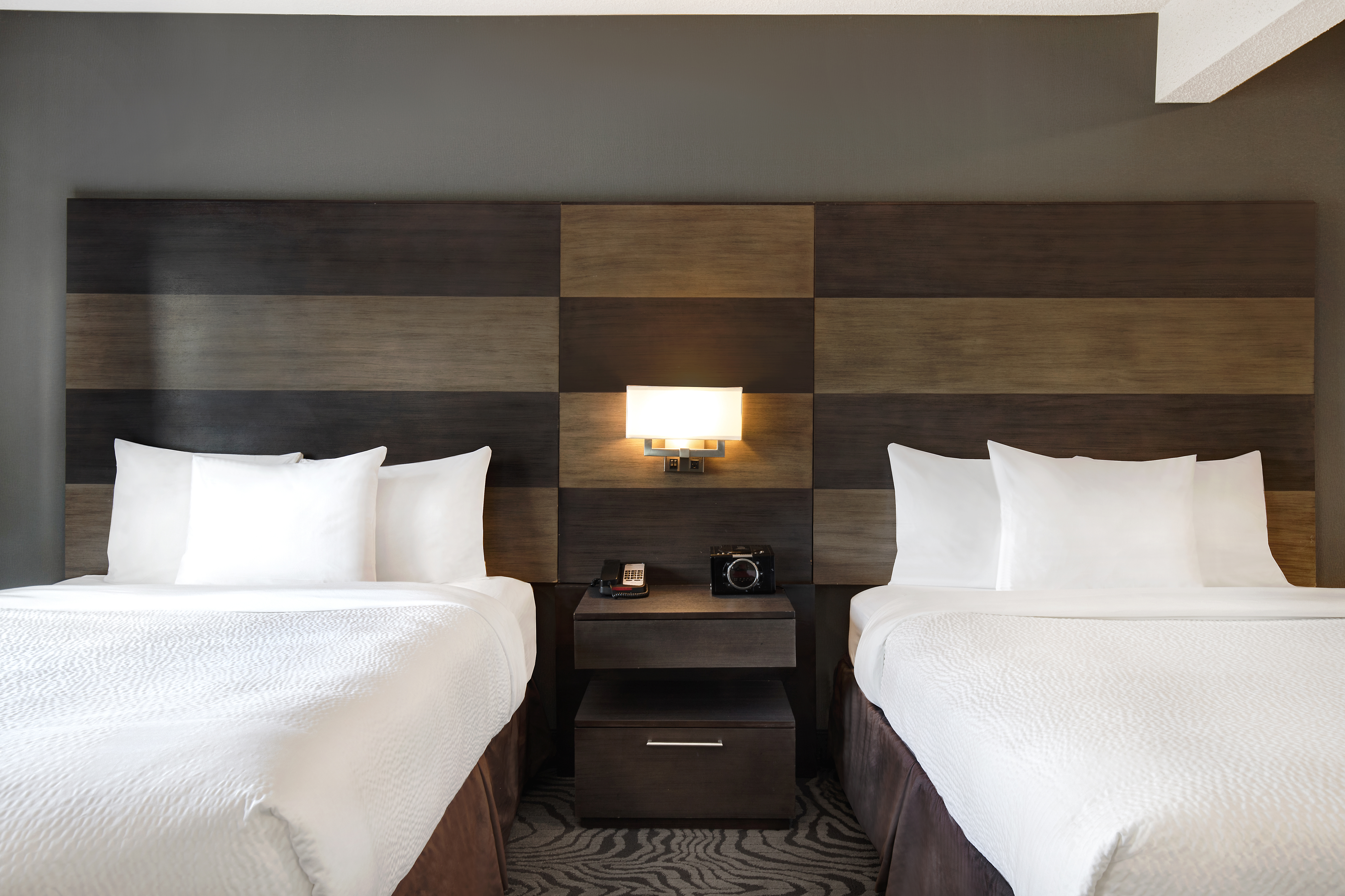 Guest room at the Days Inn by Wyndham Calgary South in Calgary, Alberta