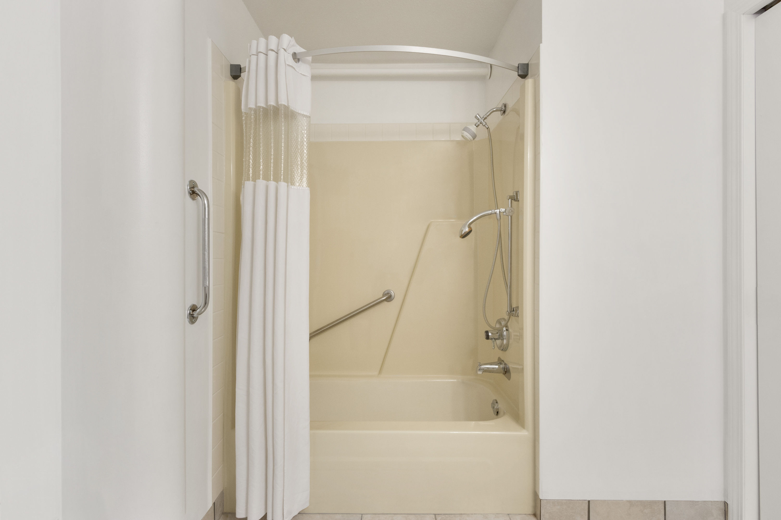 Guest room bath at the Days Inn by Wyndham Lethbridge in Lethbridge, Alberta