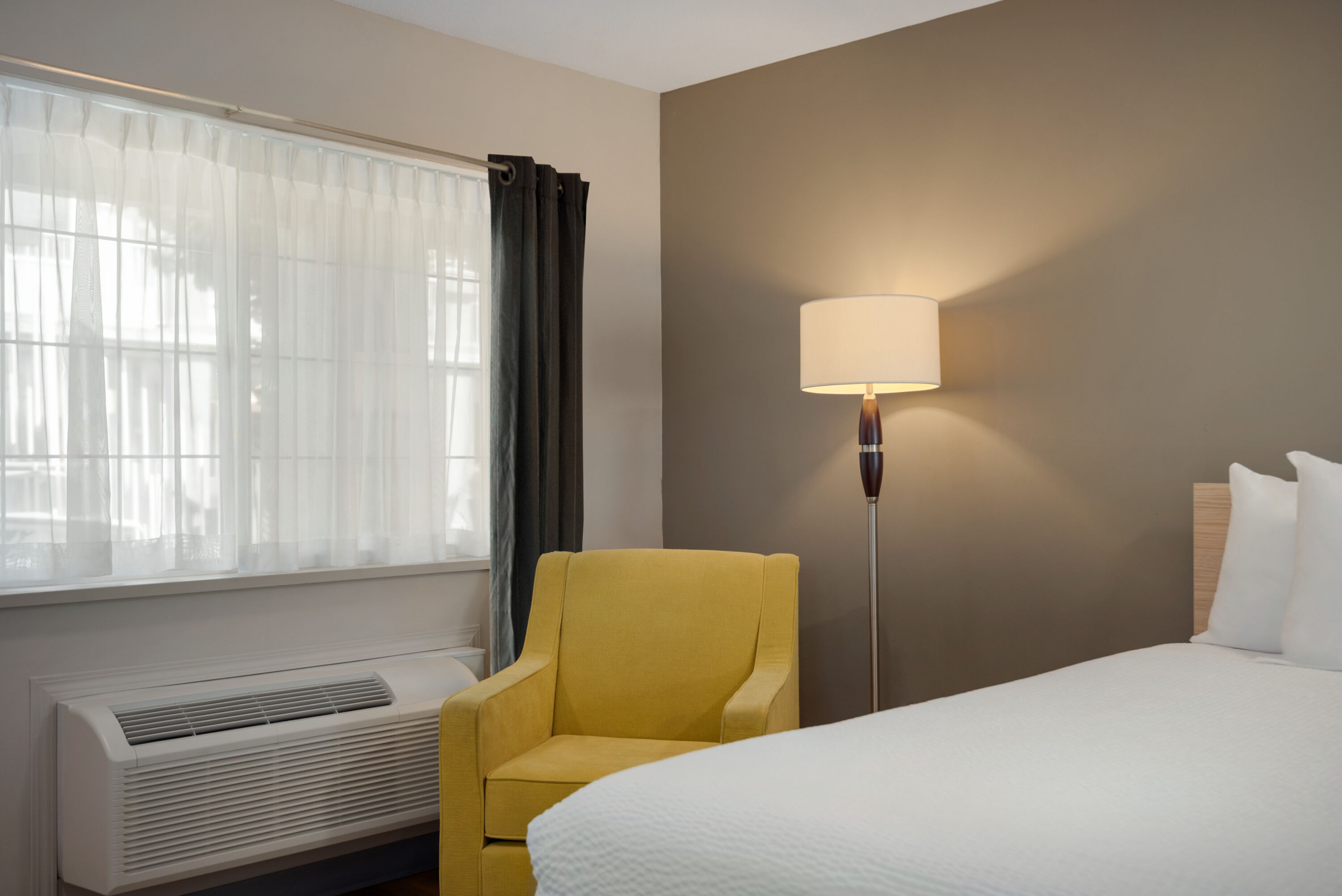 Guest room at the Days Inn by Wyndham Kelowna in Kelowna, British Columbia