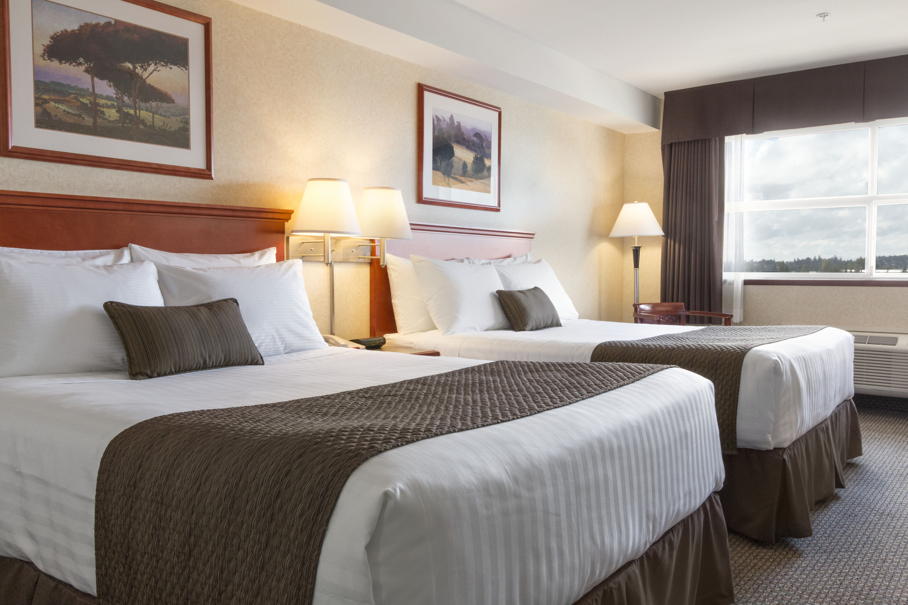 Guest room at the Days Inn & Suites by Wyndham Langley in Langley, British Columbia