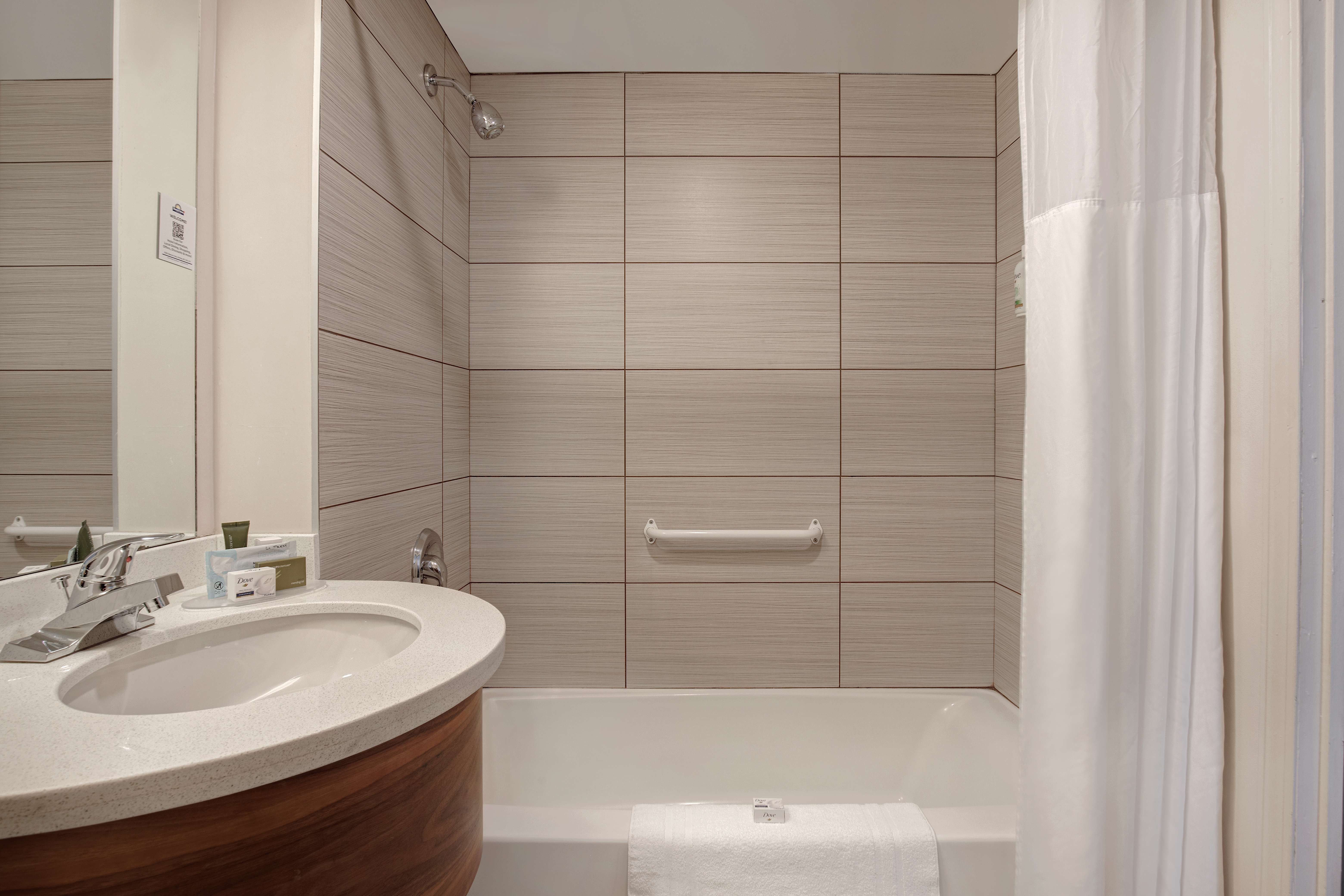 Guest room bath at the Days Inn by Wyndham Victoria Airport Sidney in Sidney, British Columbia