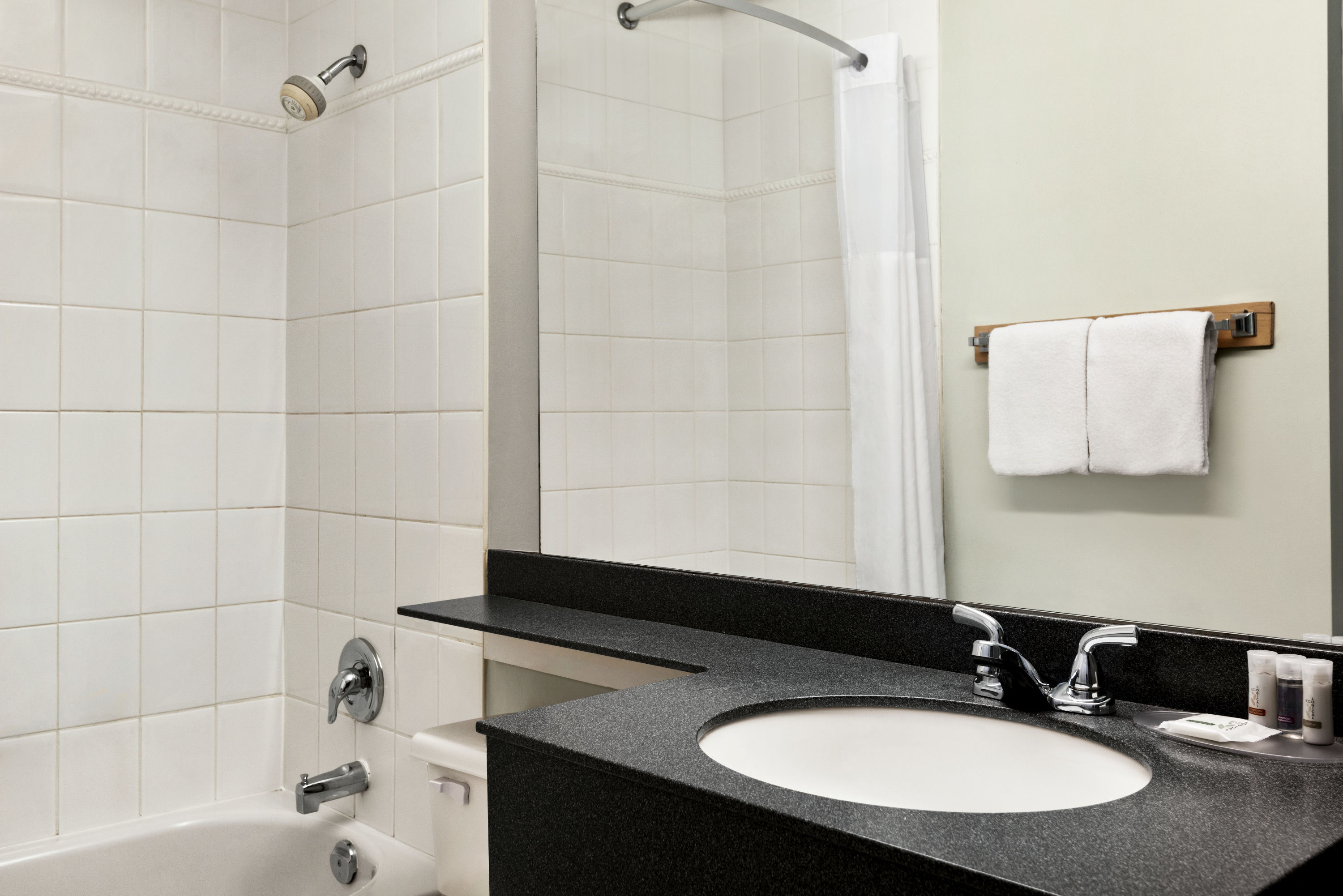 Guest room bath at the Days Inn by Wyndham Vancouver Downtown in Vancouver, British Columbia