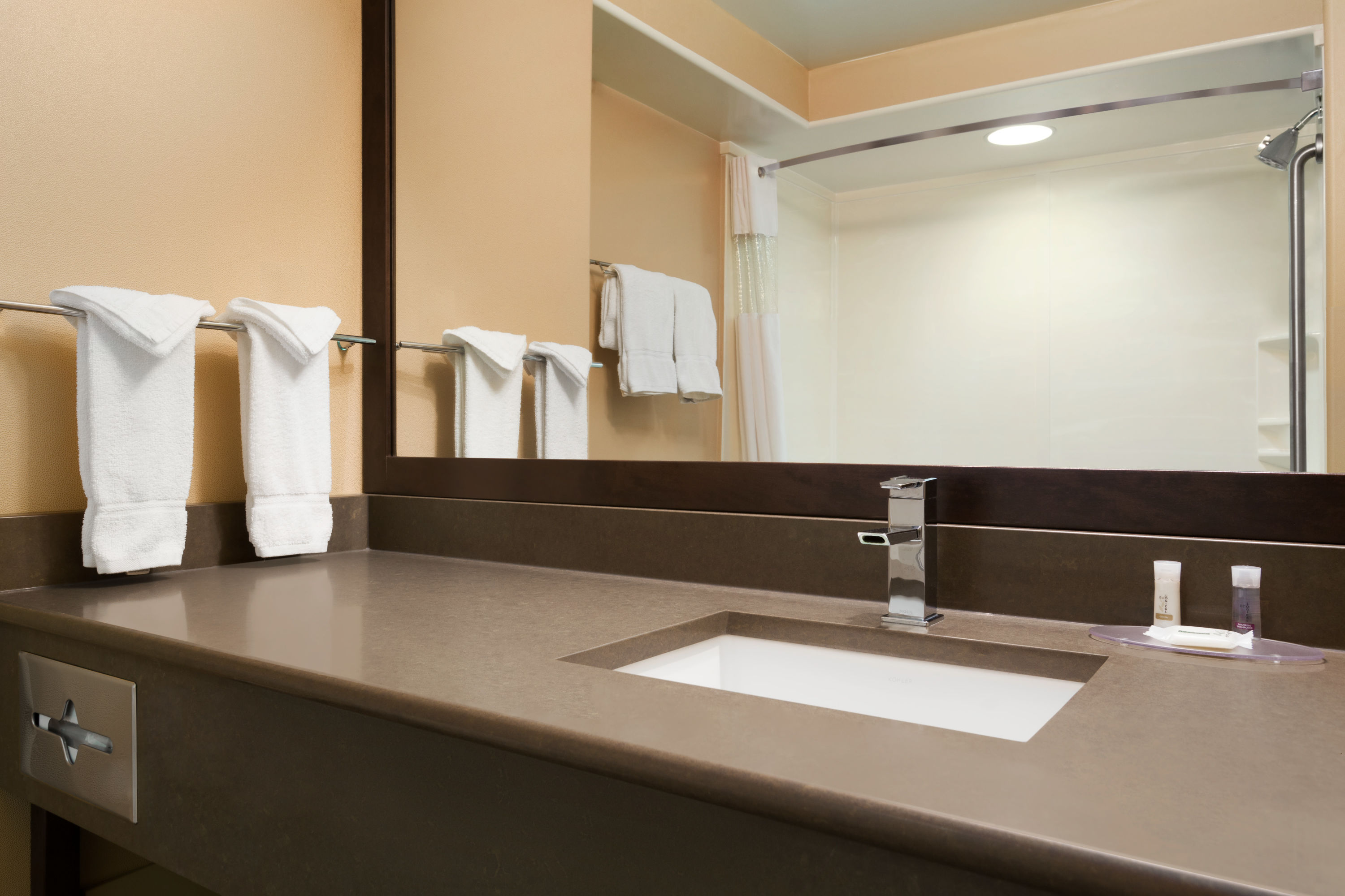 Guest room bath at the Days Inn & Suites by Wyndham Brandon in Brandon, Manitoba