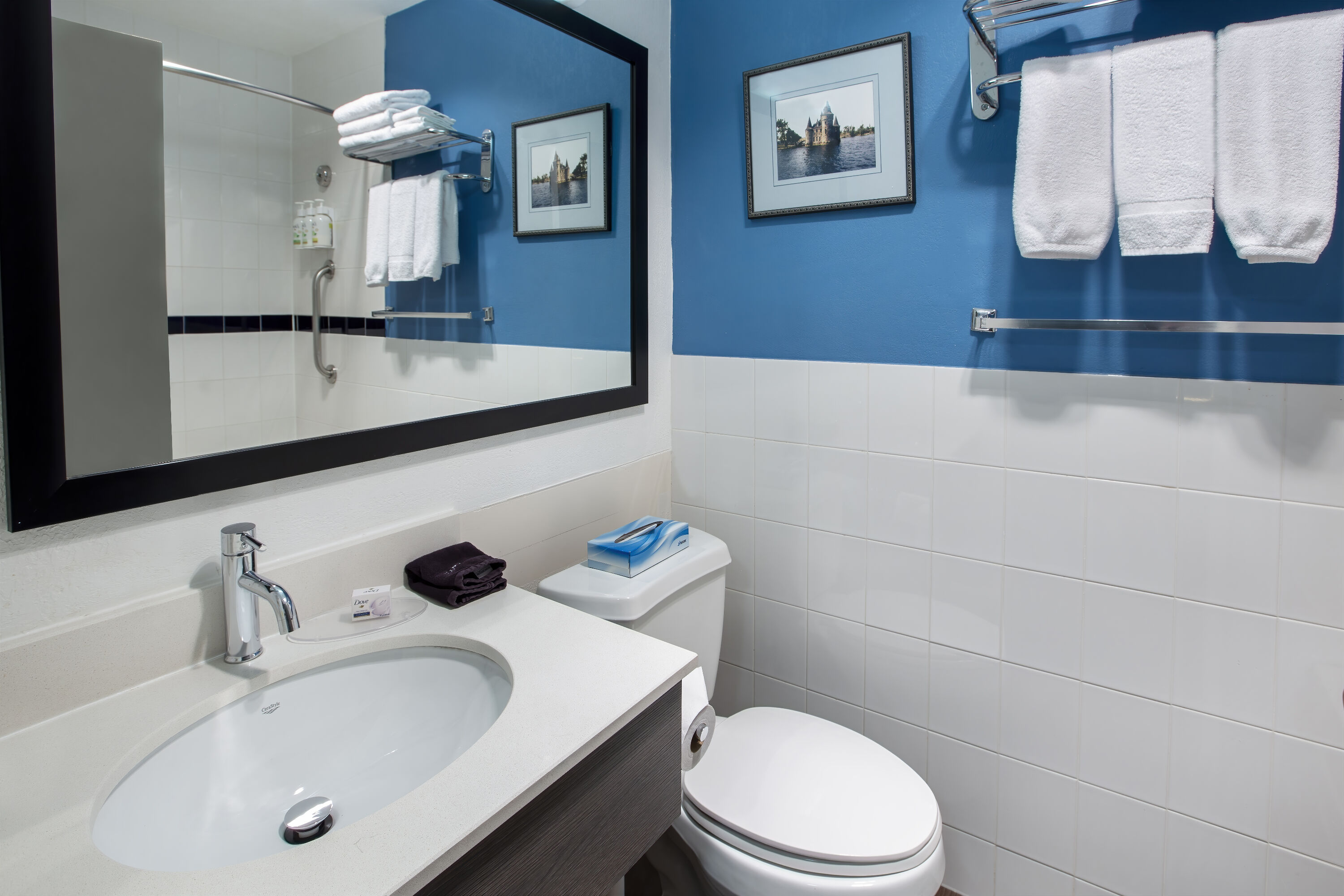 Guest room bath at the Days Inn & Suites by Wyndham Moncton in Moncton, New Brunswick