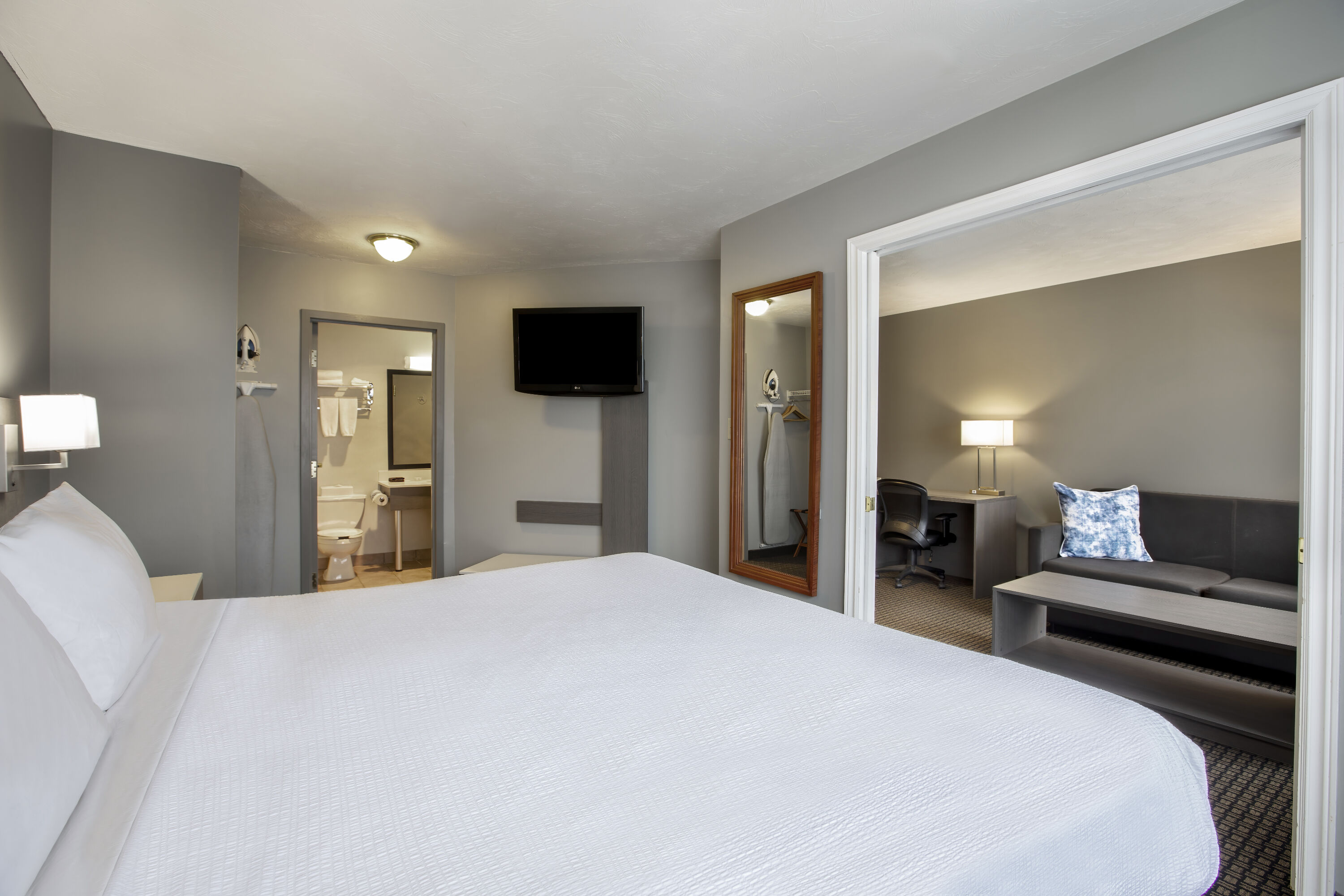 Guest room at the Days Inn & Suites by Wyndham Moncton in Moncton, New Brunswick