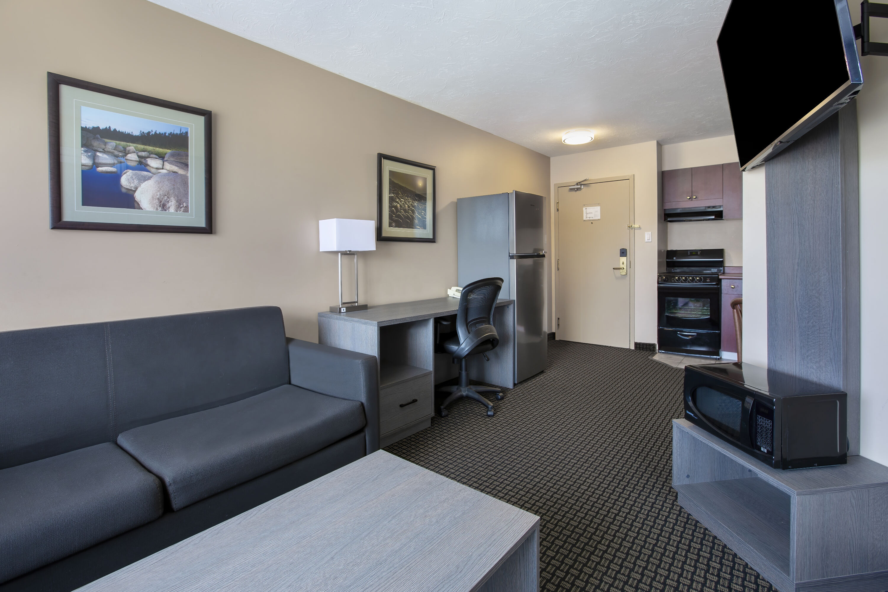 Guest room at the Days Inn & Suites by Wyndham Moncton in Moncton, New Brunswick