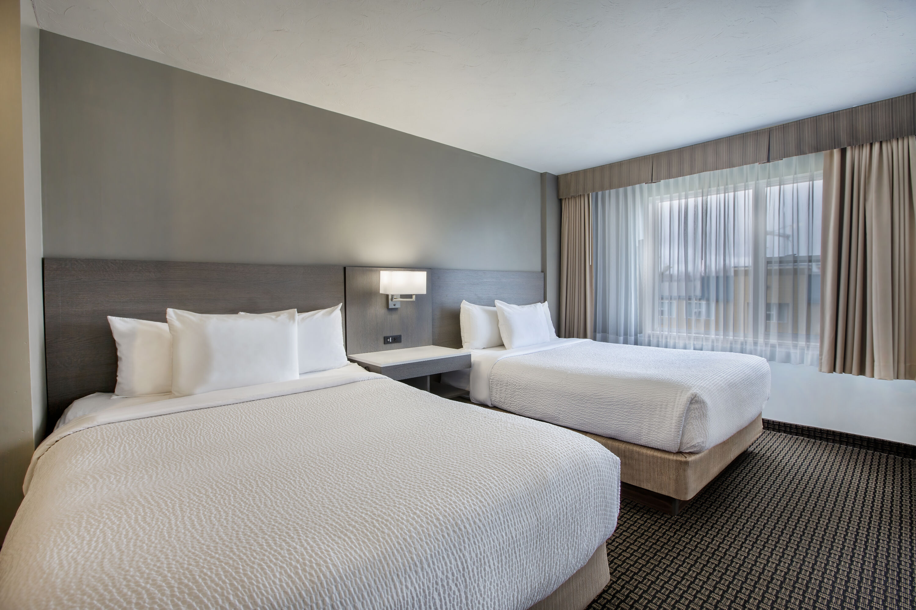Guest room at the Days Inn & Suites by Wyndham Moncton in Moncton, New Brunswick