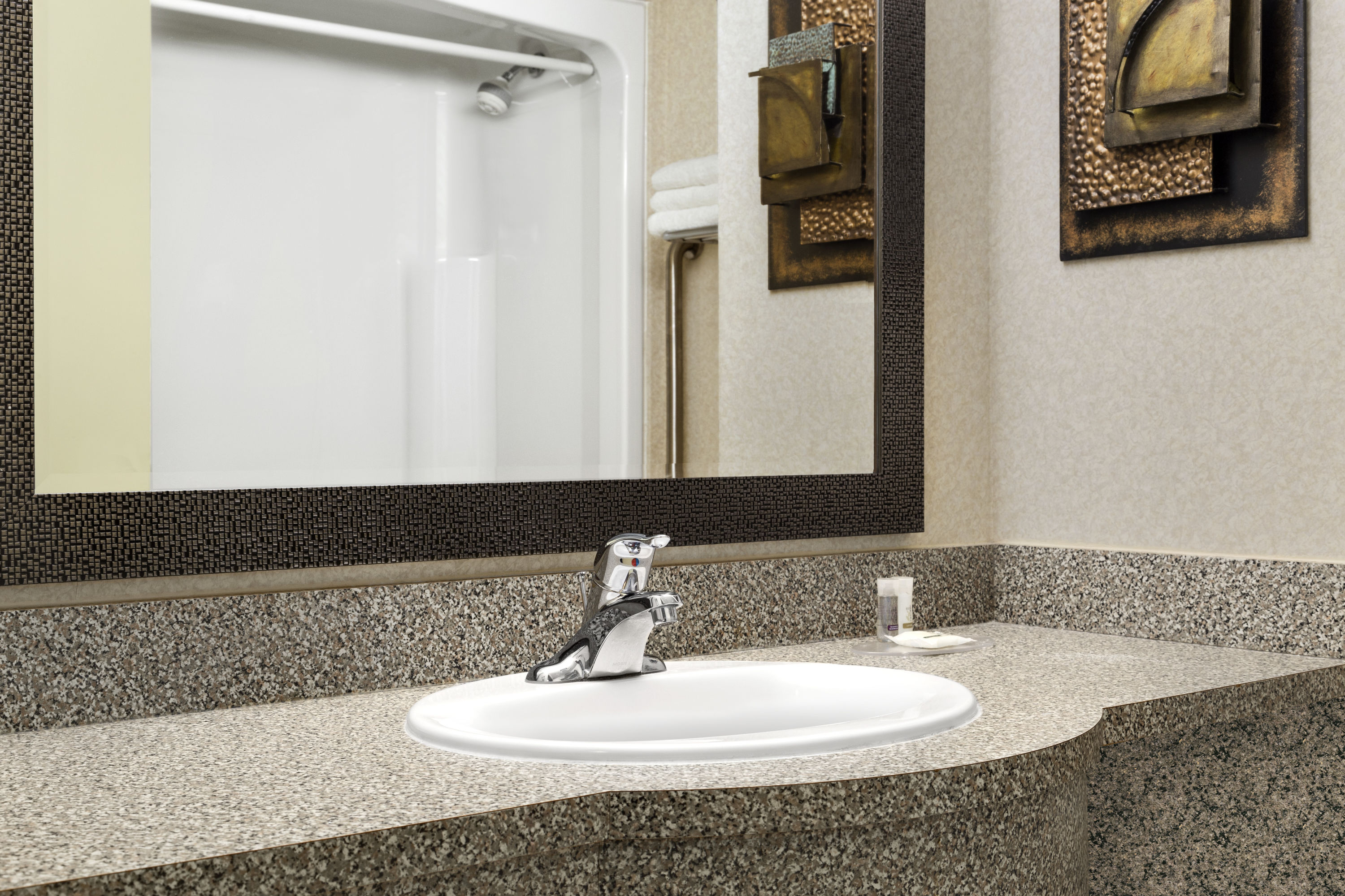 Guest room bath at the Days Inn by Wyndham Niagara Falls Centre St. By the Falls in Niagara Falls, Ontario